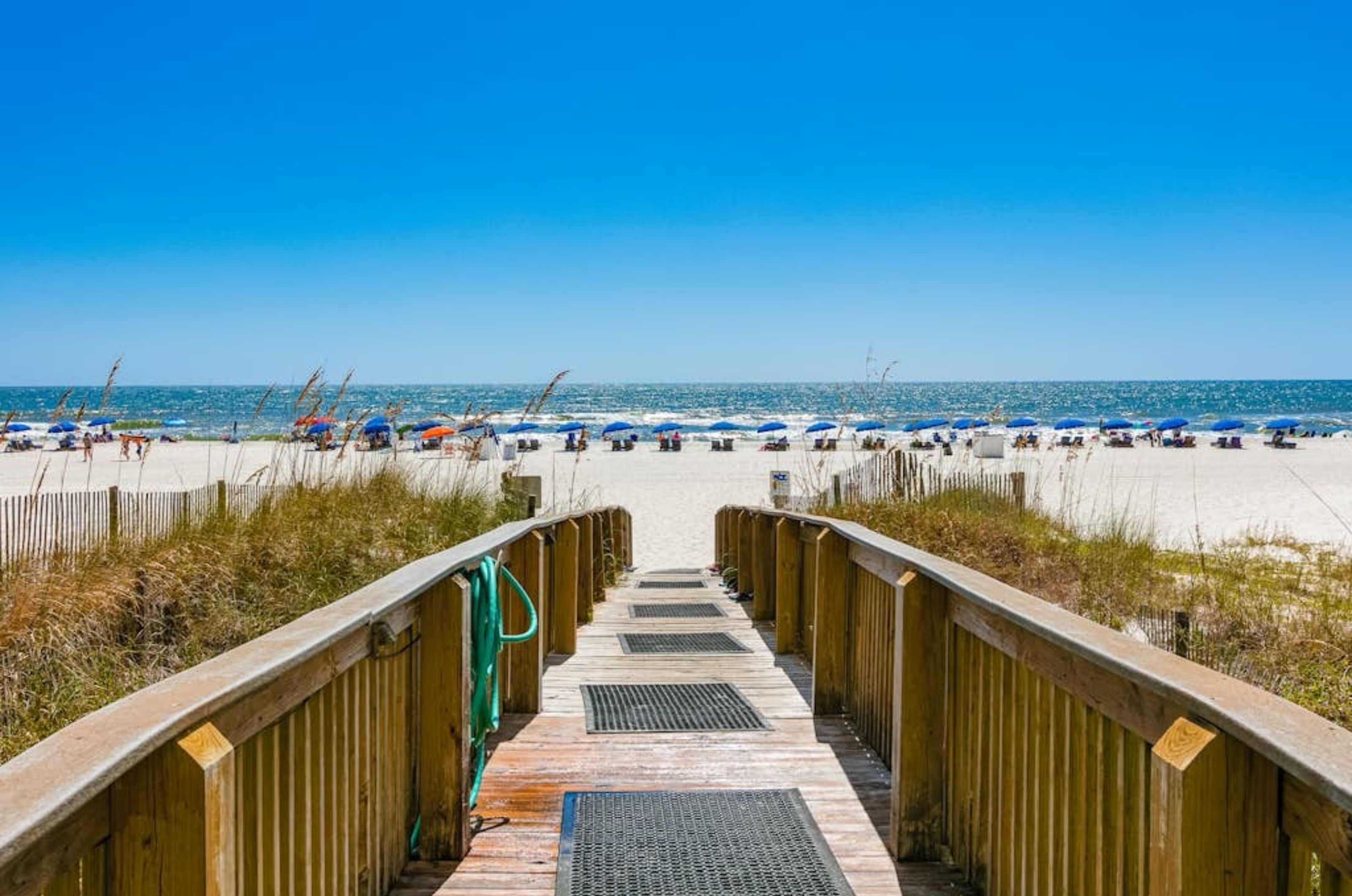 The boardwalk leading to the beach at Admirals Quarters