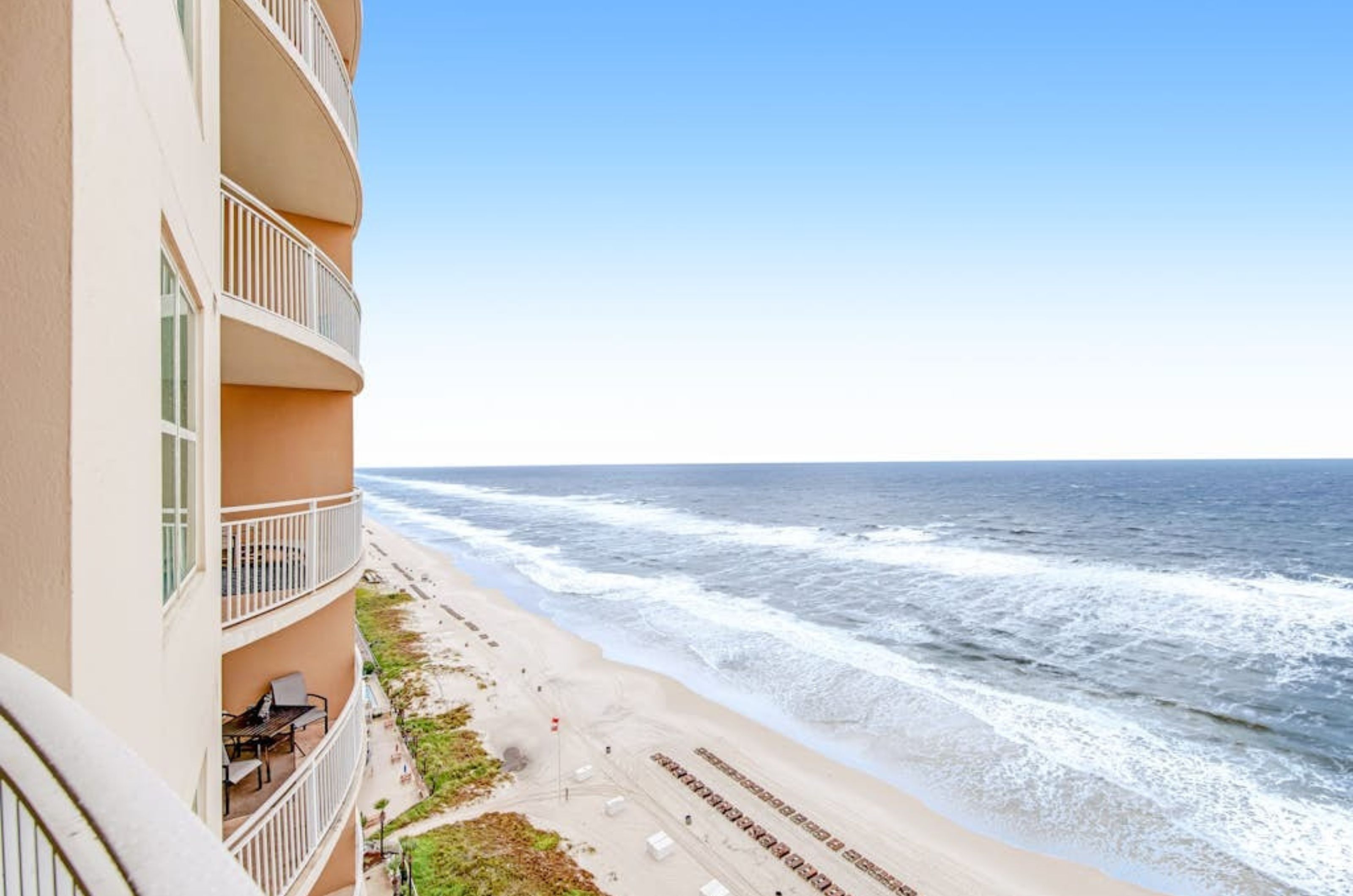 View looking down the coast from a terrace at Aqua Resort in Panama City Beach Florida 