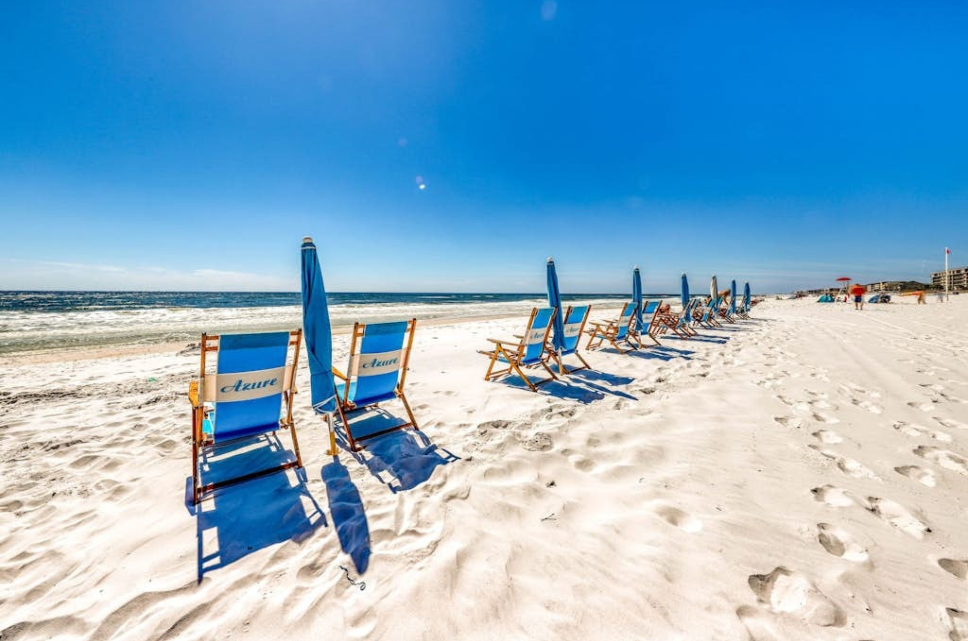 Azure's blue lounge chairs and beach umbrellas