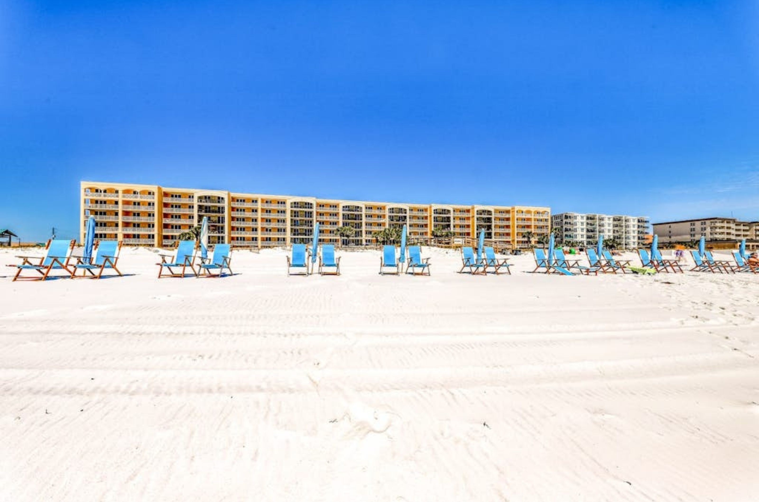 View from the Gulf of Azure and the property's beach chairs and umbrellas	