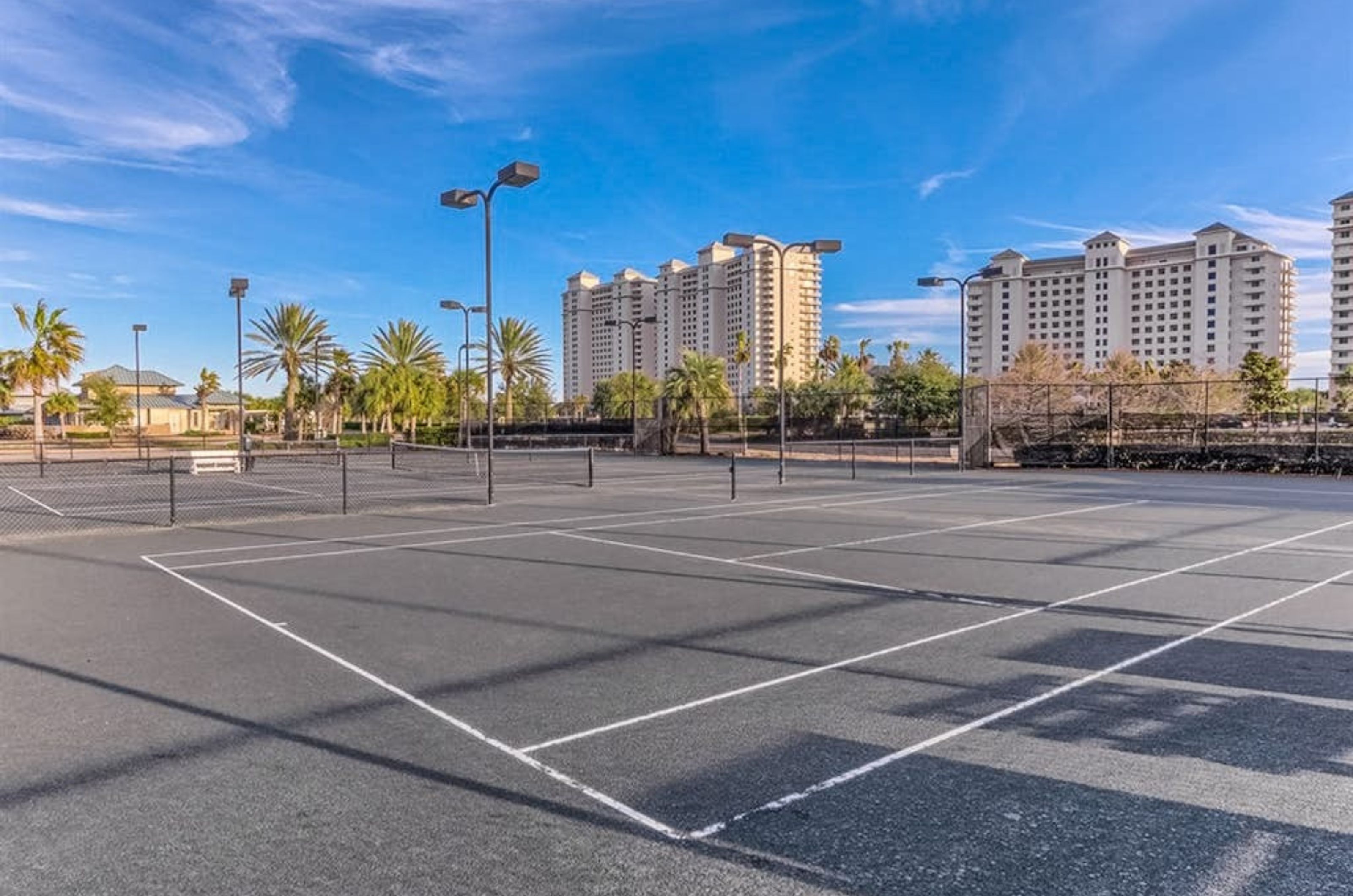 View of the outdoor tennis courts in front of Beach Club Resort