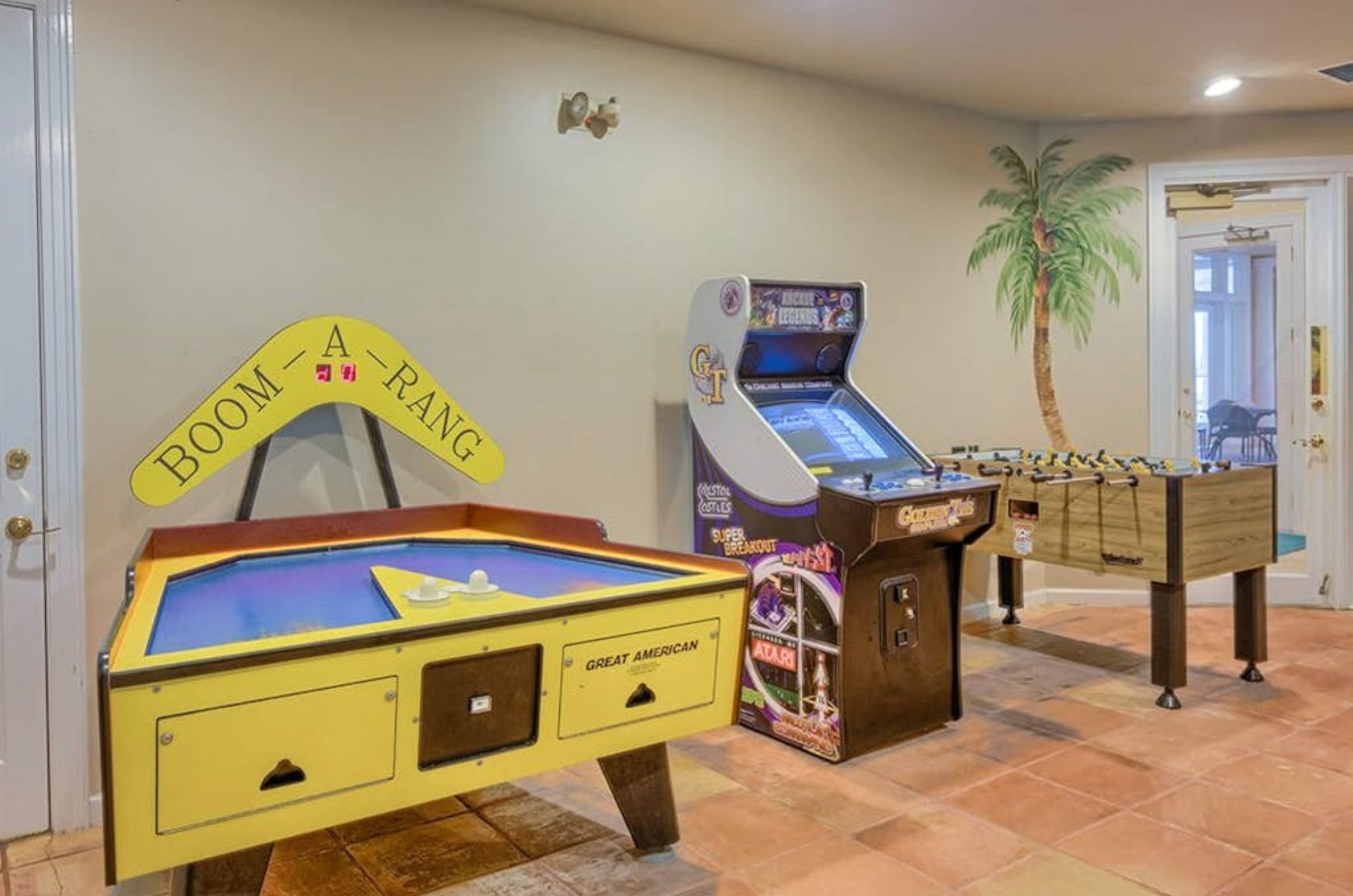 A variety of arcade games in the on-site game room 