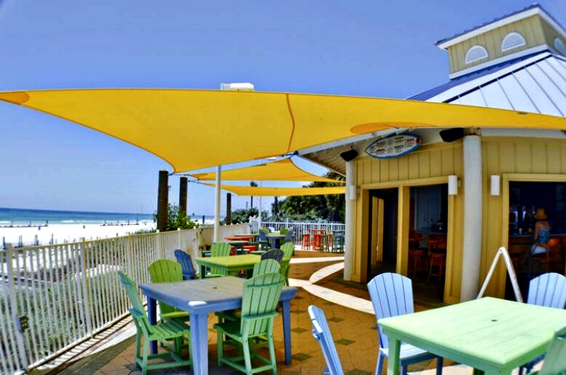 Outdoor seating at the Boardwalk Beach Resort beachfront bar in Panama City
