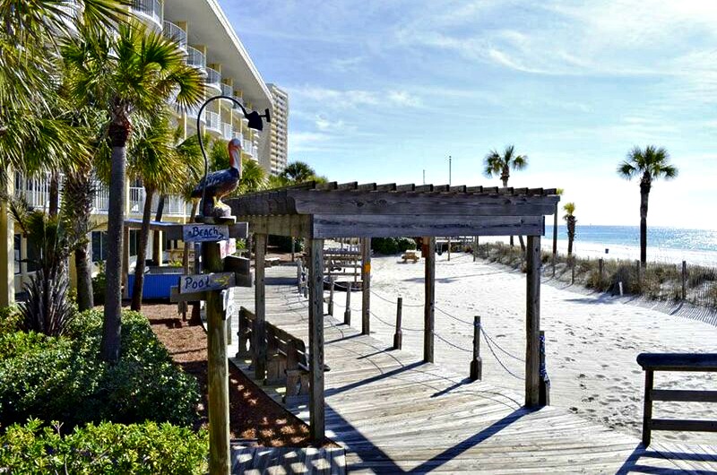 Beachfront walkway and pelican sign at Boardwalk Beach Resort Hotel in Panama City