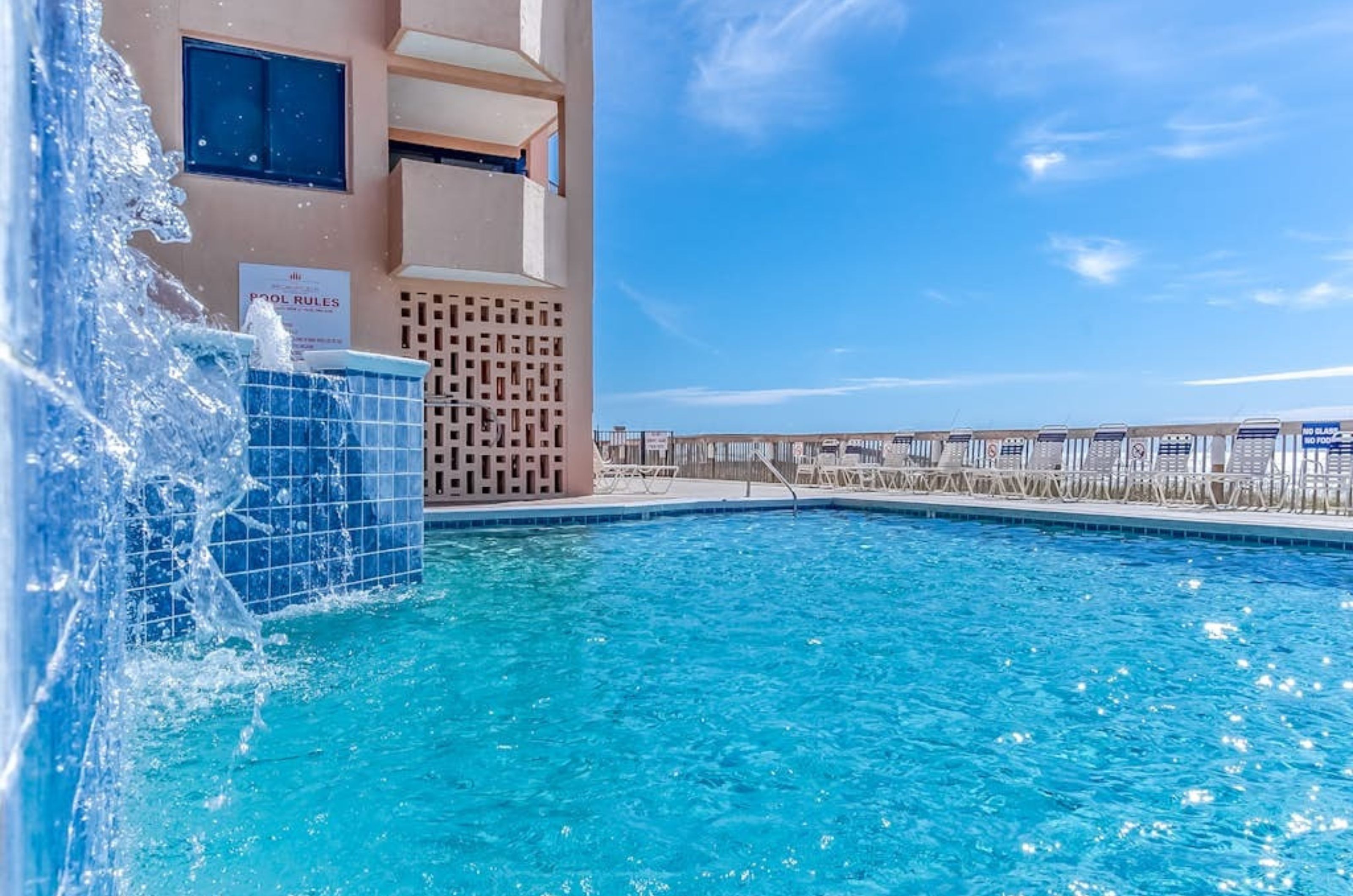 The outdoor swimming pool at Broadmoor Condos in Orange Beach Alabama	