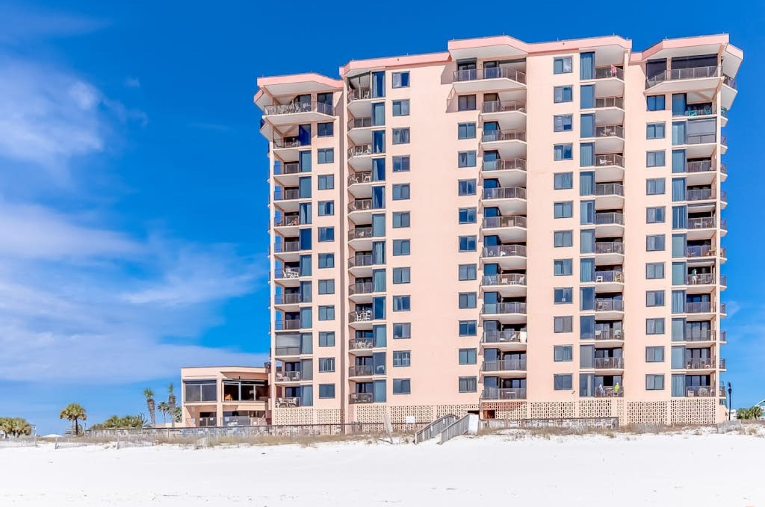 View from the beach of the Gulf-side exterior of Broadmoor Condominiums	