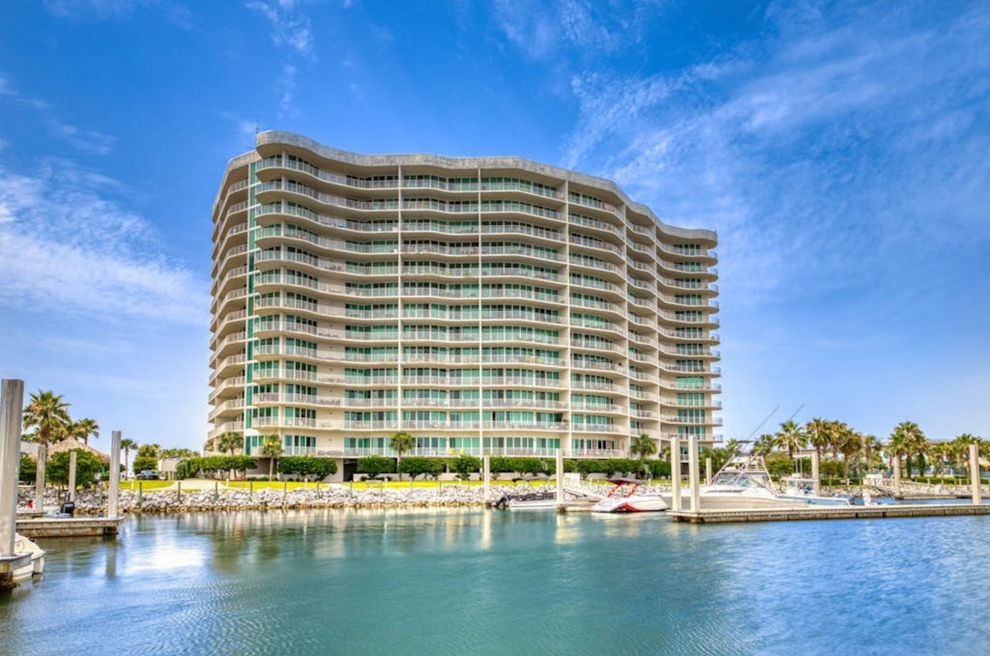 The exterior of Caribe Resort with the Gulf in front in Orange Beach Alabama 