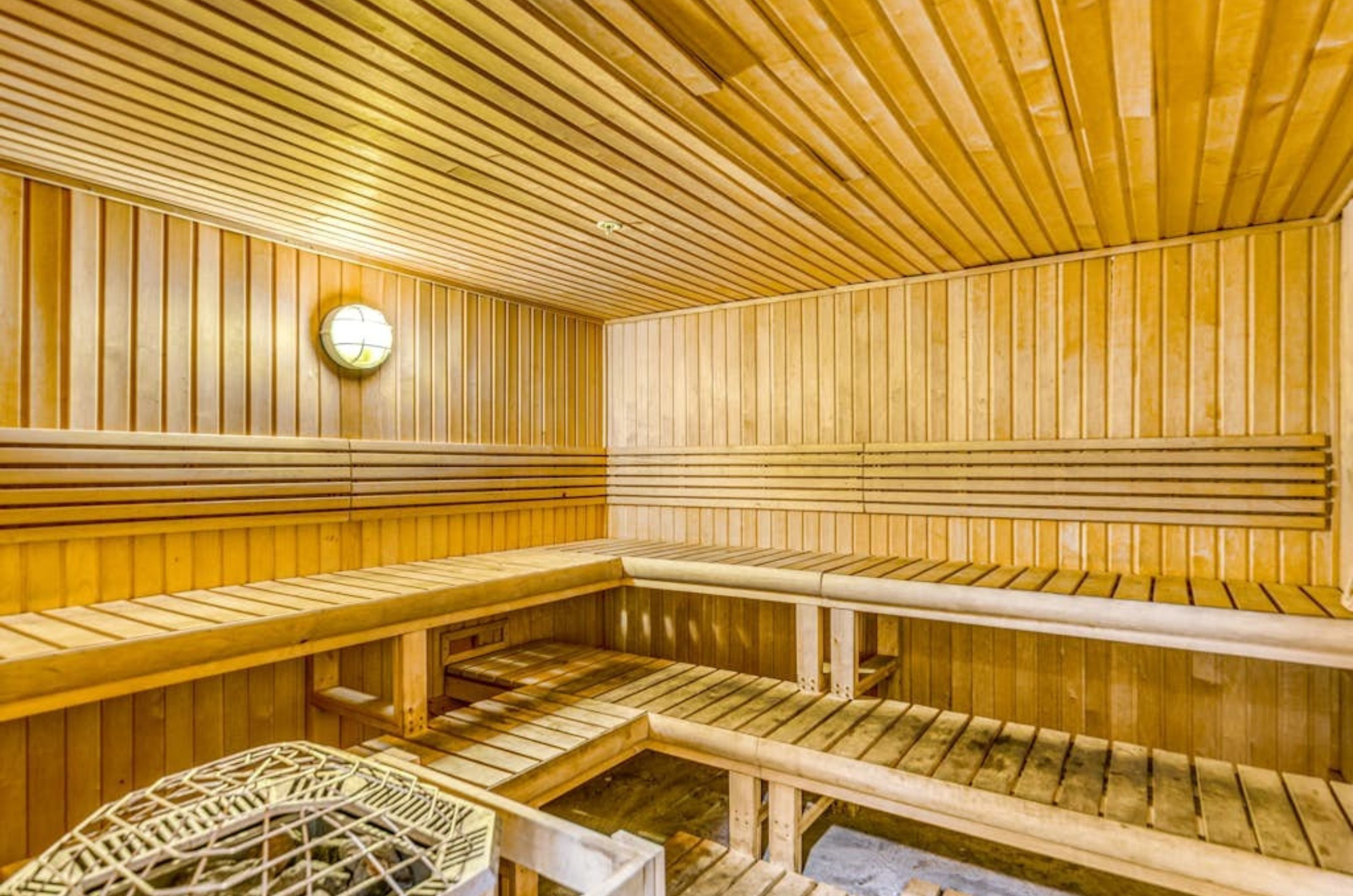 The wooden interior of the sauna at Crystal Towers