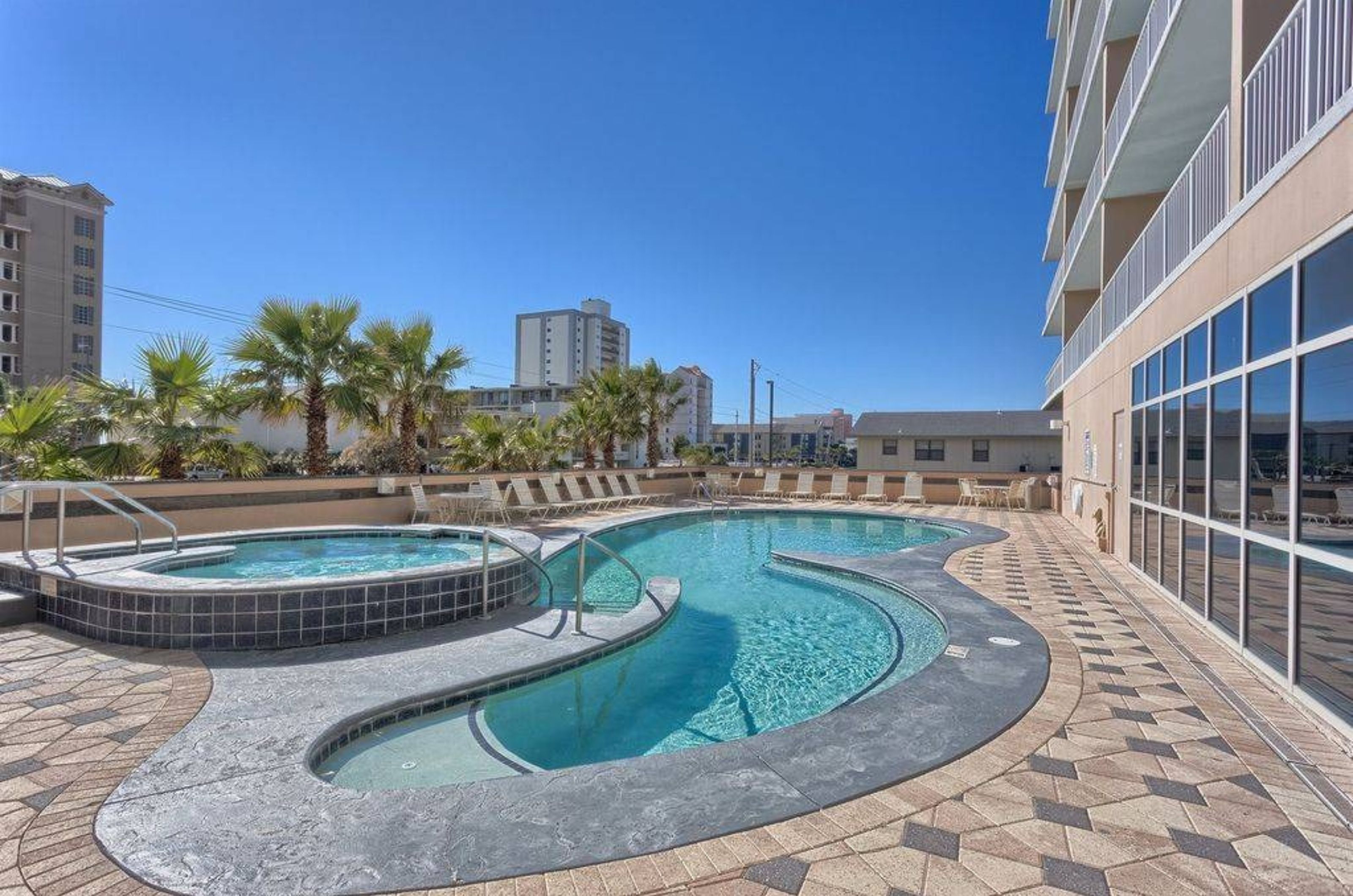 The second outdoor swimming pool and hot tub at Crystal Towers