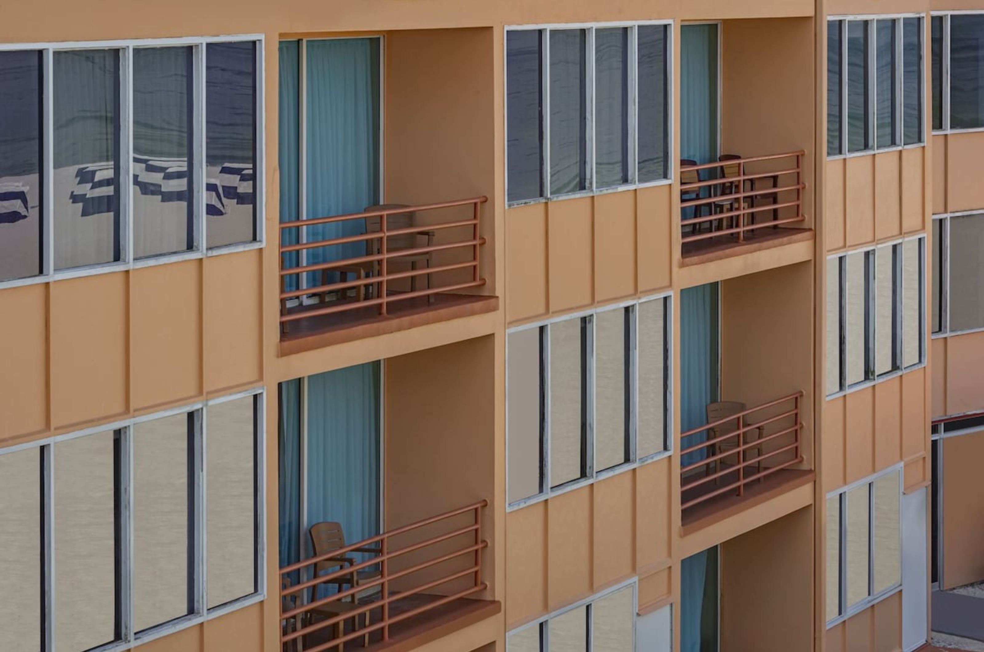 Close up of private balconies and the exterior of Dolphin Beach Resort 