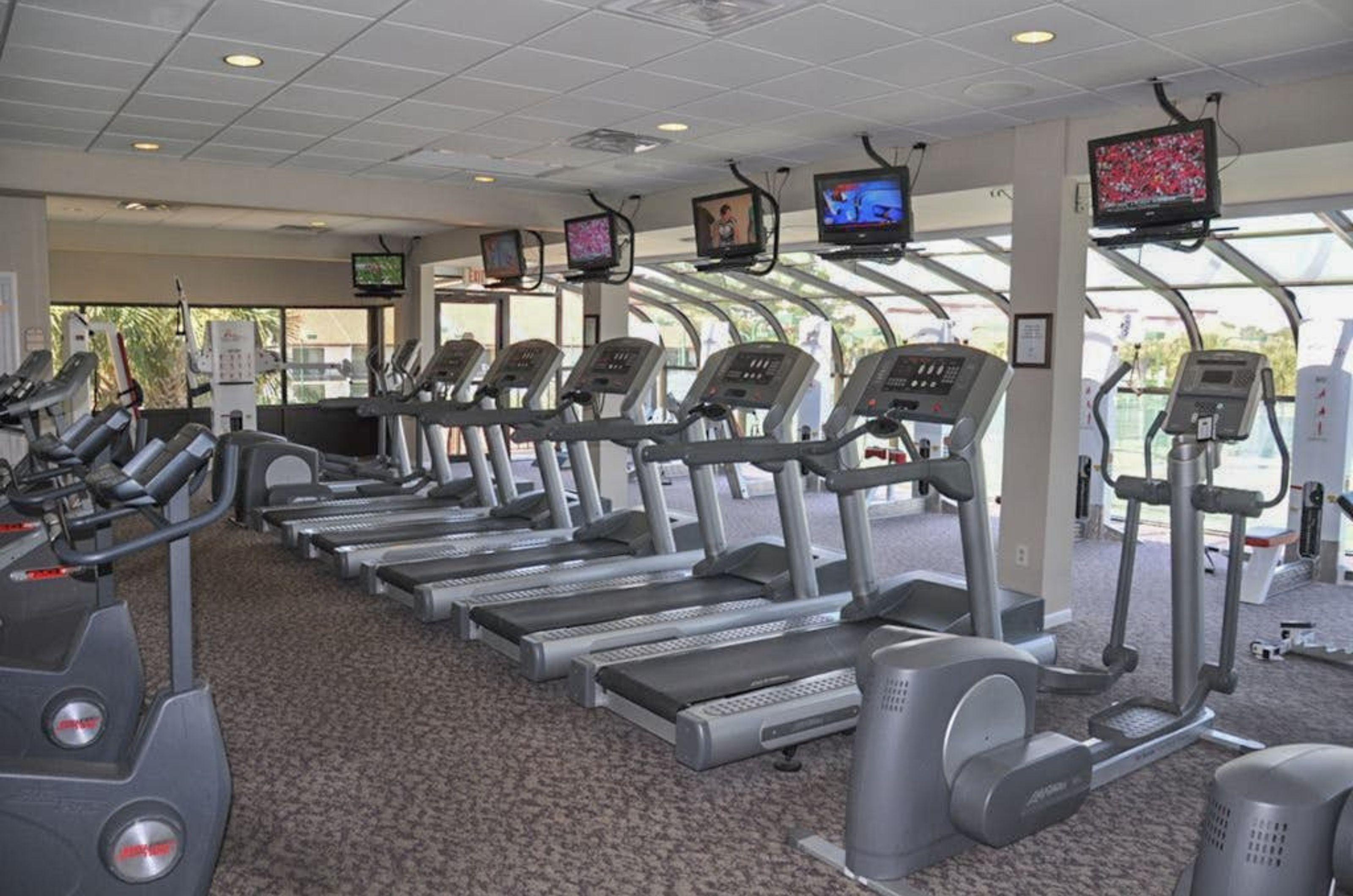 A row of cardio equipment in the gym at Edgewater Beach and Golf Resort in Panama City Beach Florida 