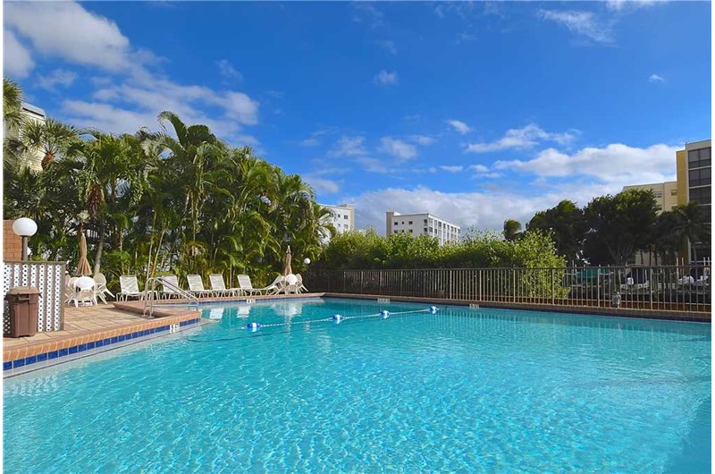 Enjoy the large heated pool at Estero Yacht & Racquet in Fort Myers Beach Florida