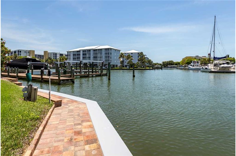 Relax as you walk along the harbor at Palm Harbor Condos in Fort Myers Beach FL