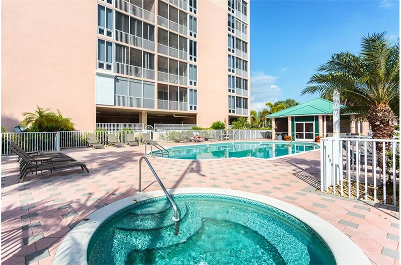 Relax by the pool and enjoy the hot tub at Palm Harbor in Fort Myers Beach FL