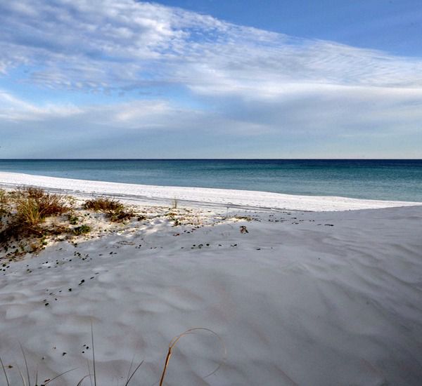 White sand beach just steps from Island Echos Condominiums in Fort Walton Florida