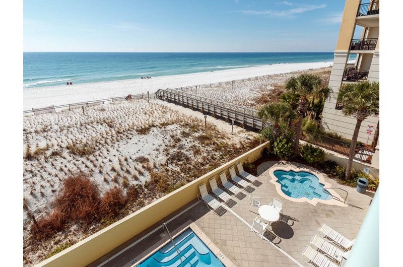 Have a birds eye view of the pool hot tub and beach at Pelican Isle Condos in Fort Walton Florida