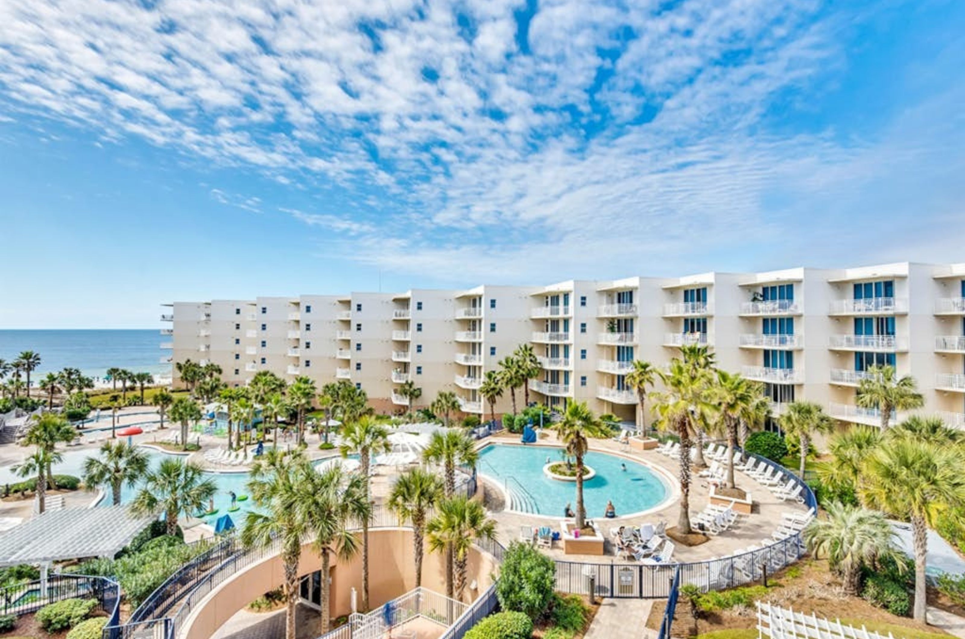 The luscious courtyard with outdoor pools infront of Waterscape in Fort Walton Beach Florida 