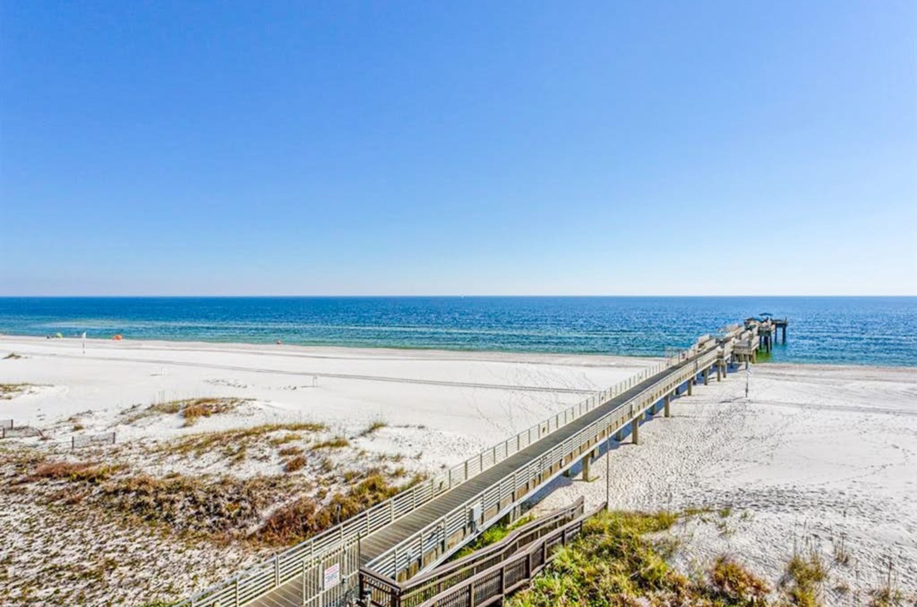 Birds eye view of the fishing pier and the Gulf at Four Seasons in Orange Beach Alabama 