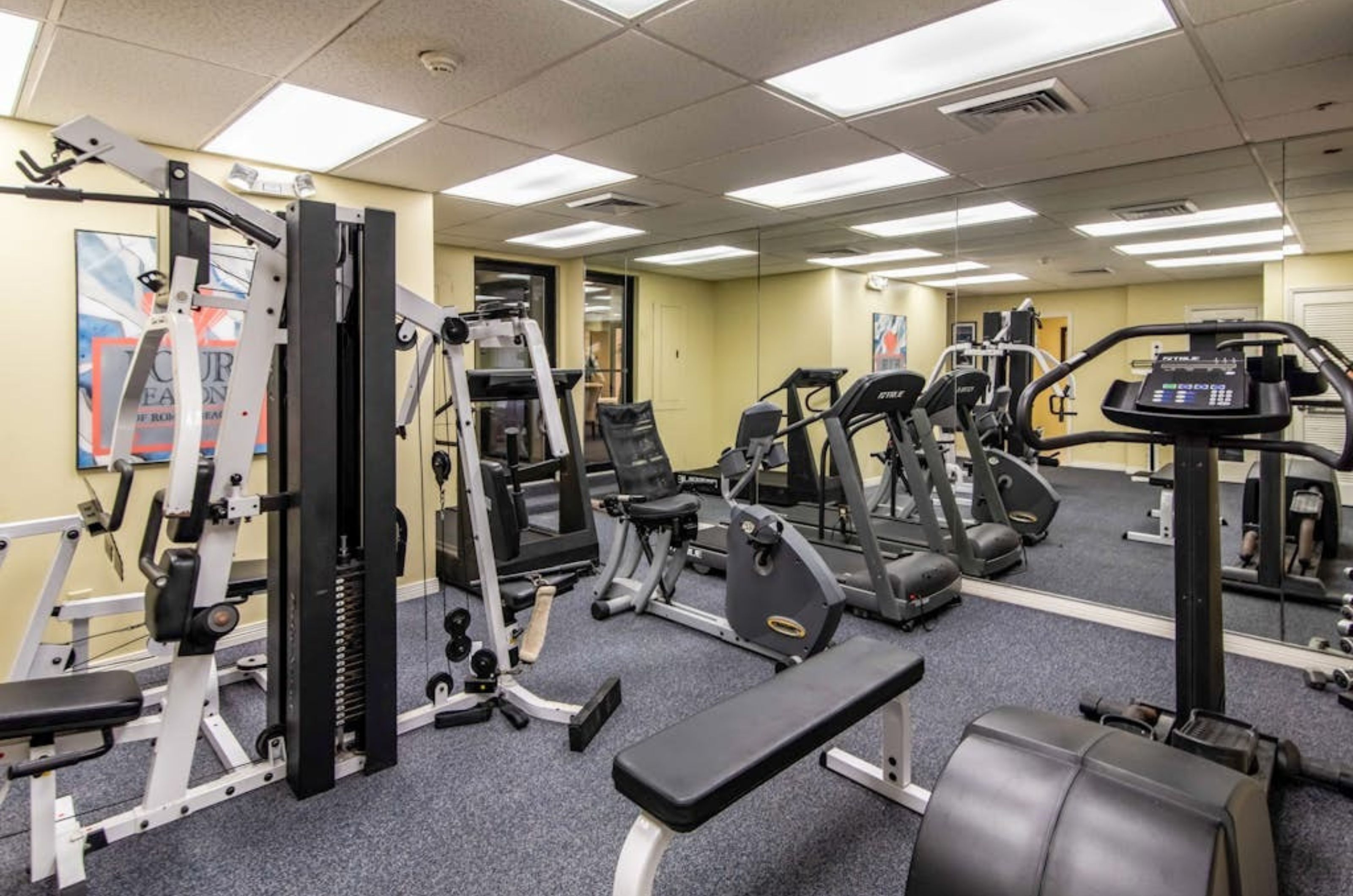 The fitness center with strength and cardio equipment at Four Seasons in Orange Beach Alabama	