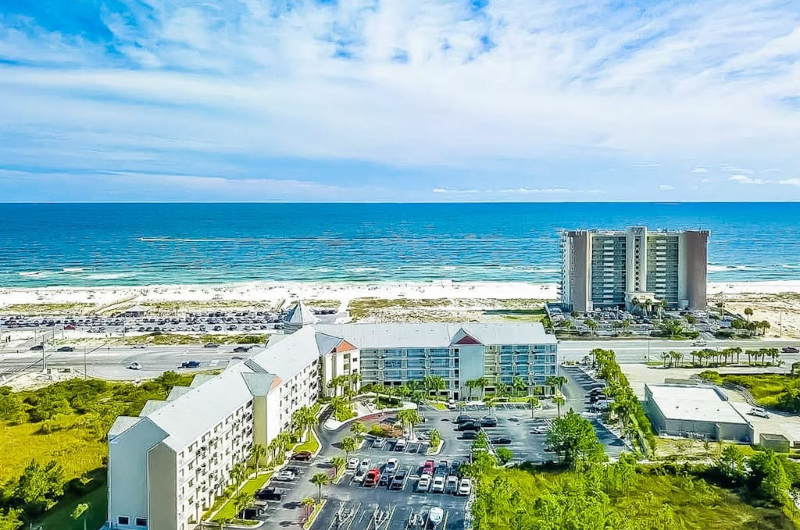 Aerial view of Grand Caribbean with the Gulf across the street in the background 