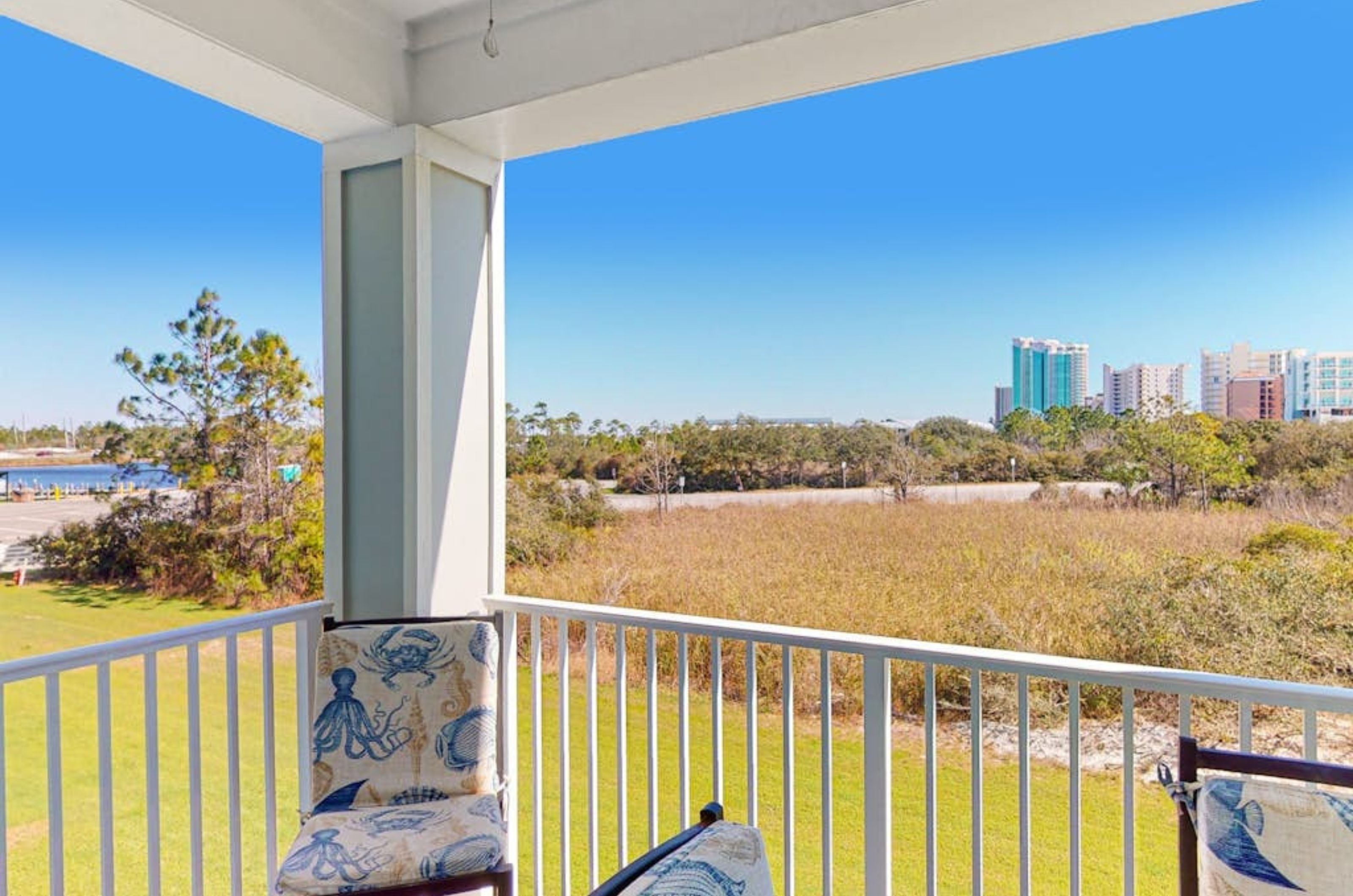 A private balcony with lounge chairs at Grand Caribbean in Orange Beach Alabama 