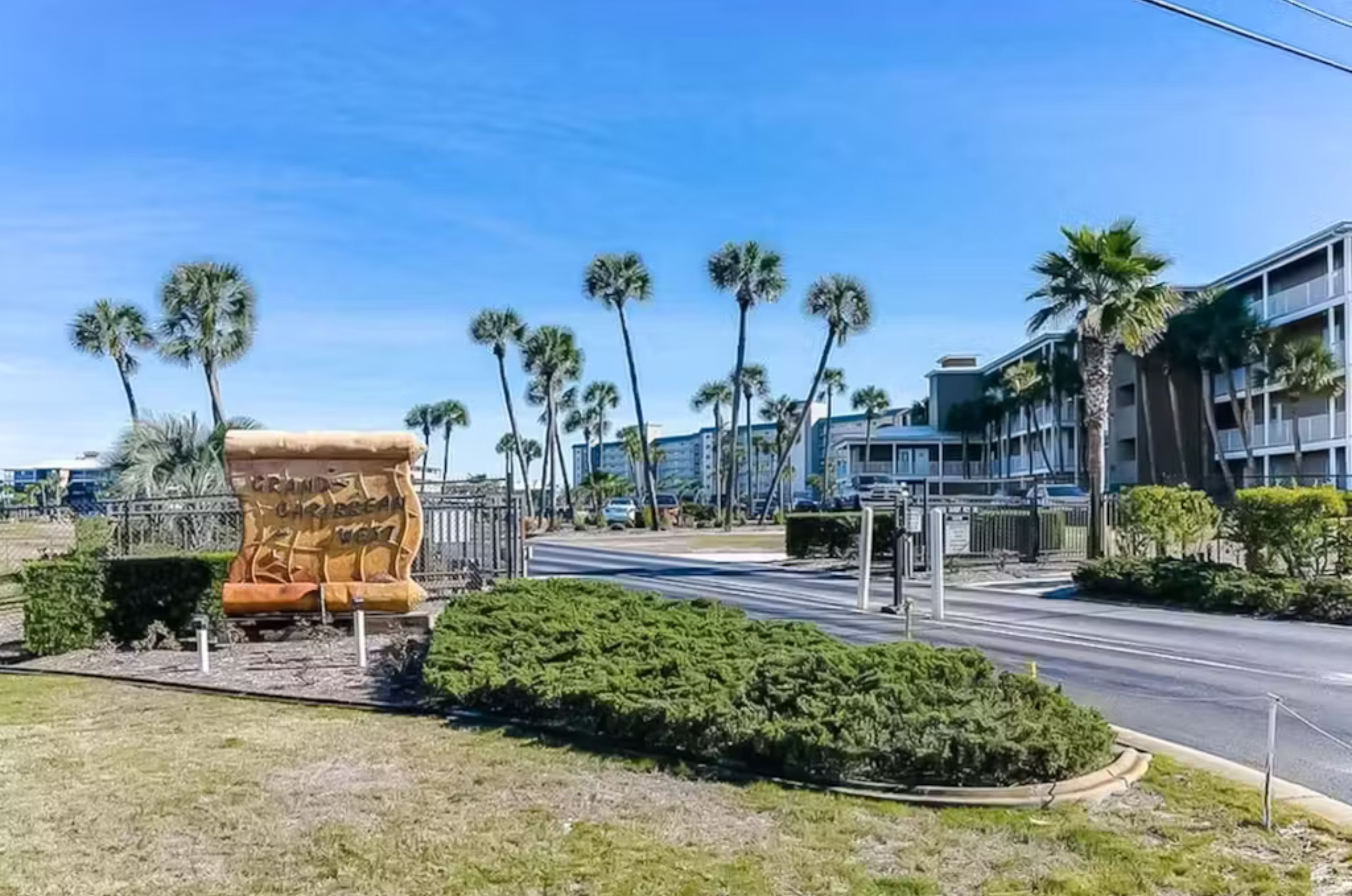 Street view of Grand Caribbean West and the property's entry sign