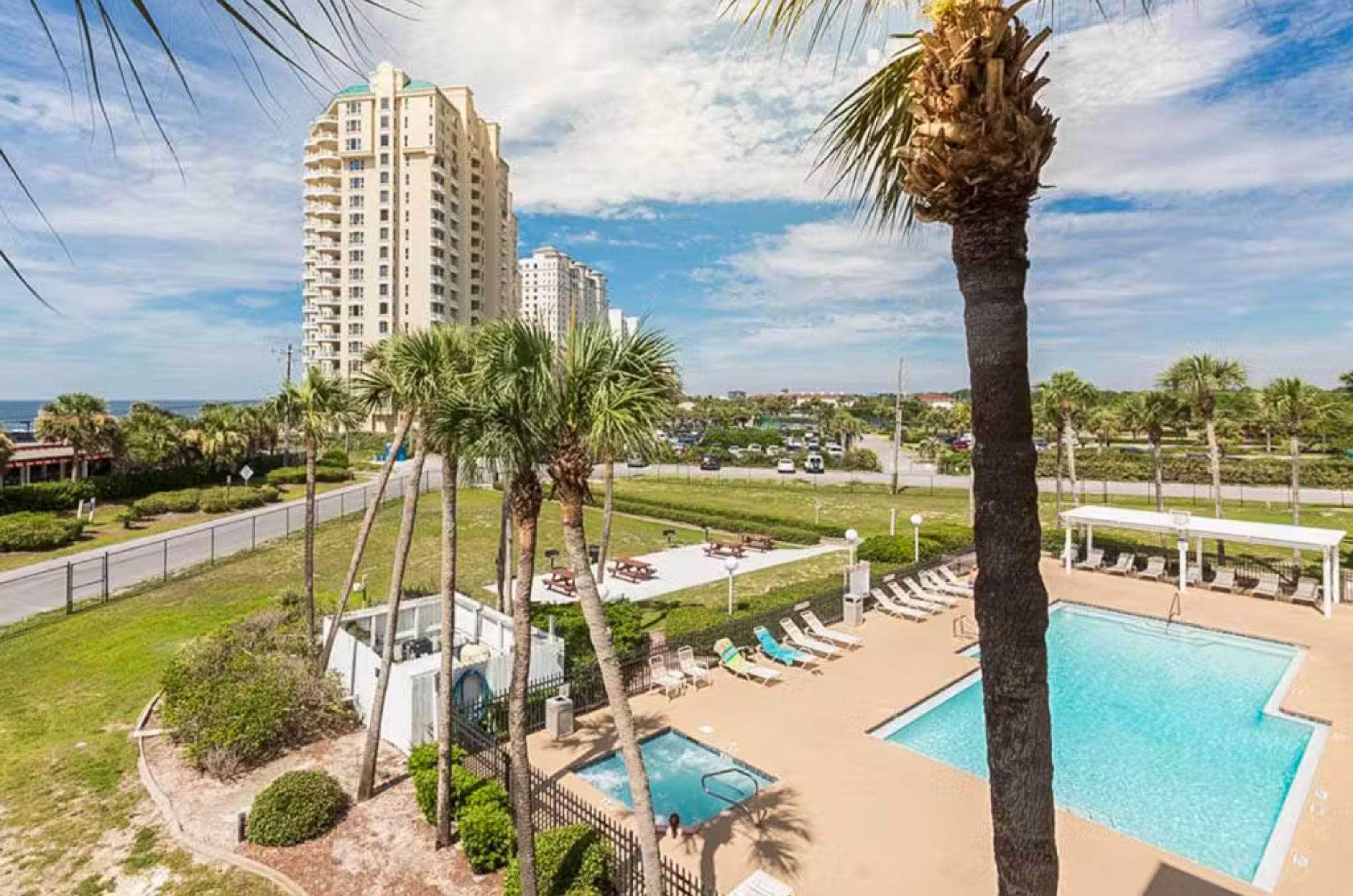 View of the pool and the Gulf from a private balcony	