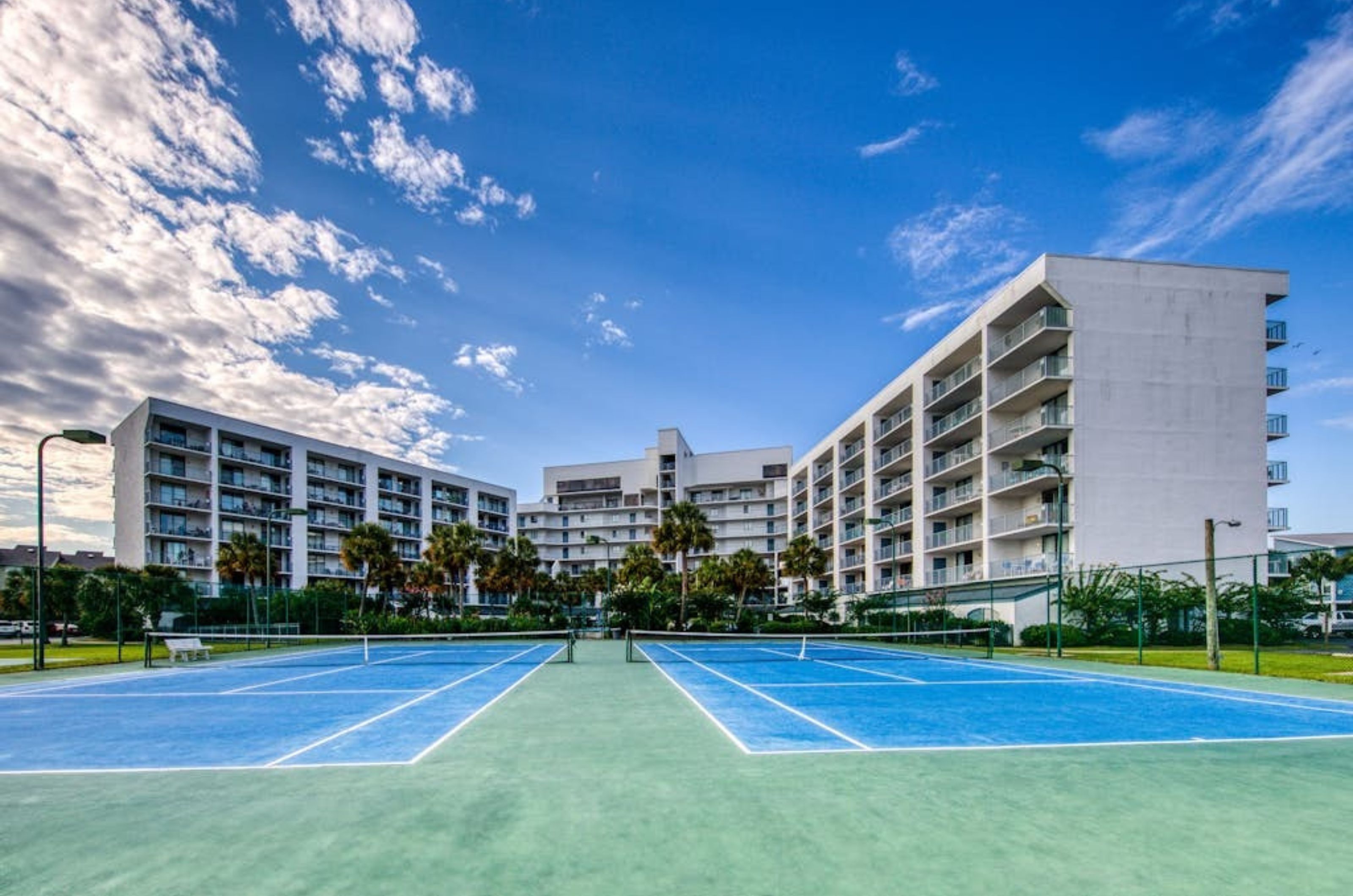 The outdoor tennis courts in front of Gulf Shores Surf and Racquet Club in Gulf Shores Alabama 