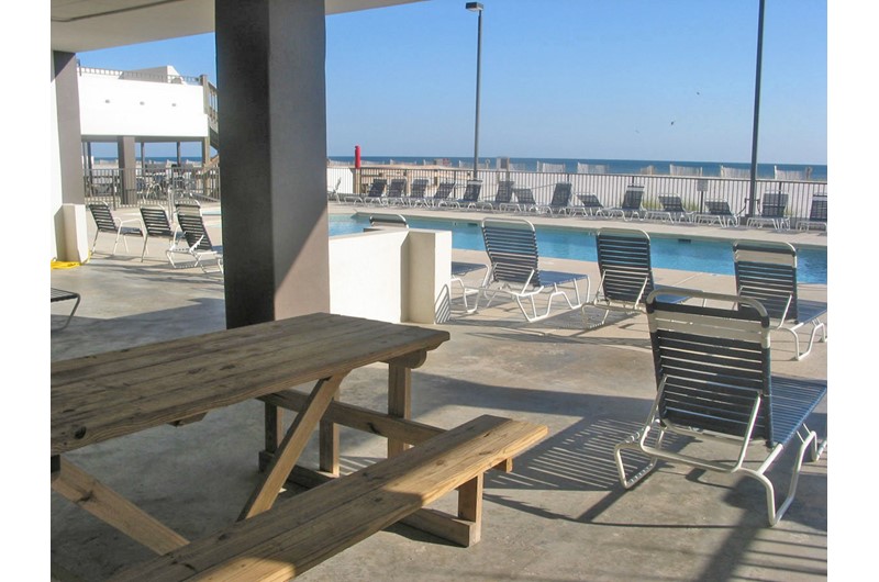 Shady pool deck for relaxing at Island Winds West in Gulf Shores AL