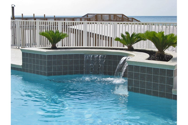 Gulf-front pool with waterfall at Legacy Gulf Shores