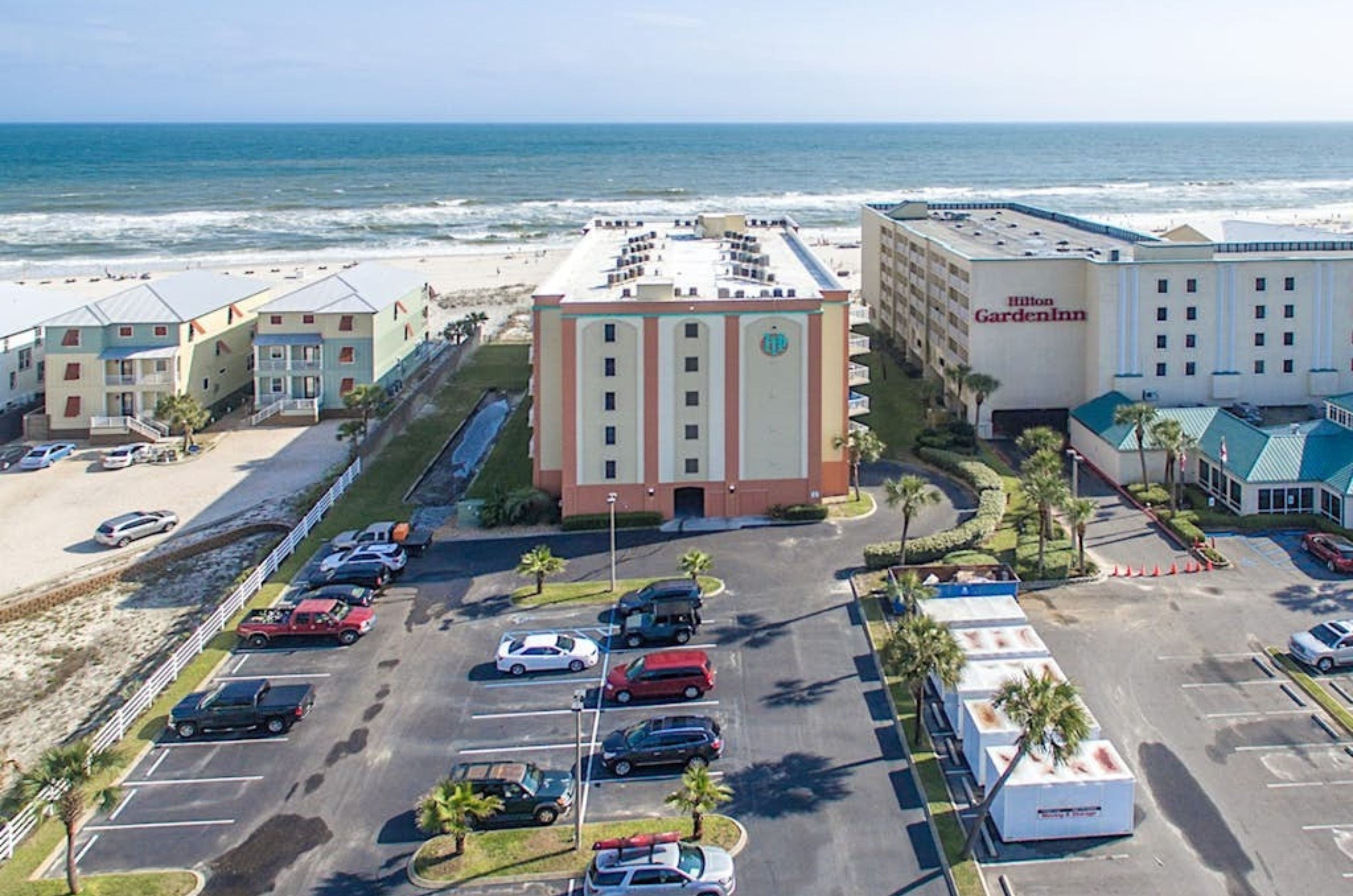 Aerial view of Harbour Place and the parking lot in Orange Beach Alabama 