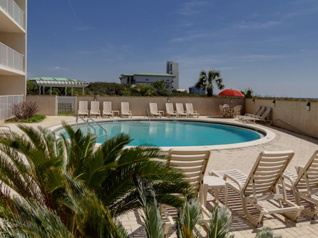 Lush landscape surrounds this large pool at Beachcrest Seagrove Beach Florida