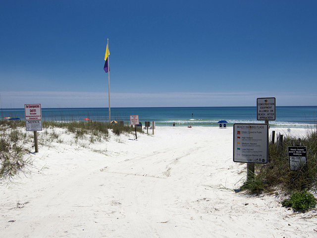 Soft white sand greats you steps from Beachfront II in Seagrove Beach Florida