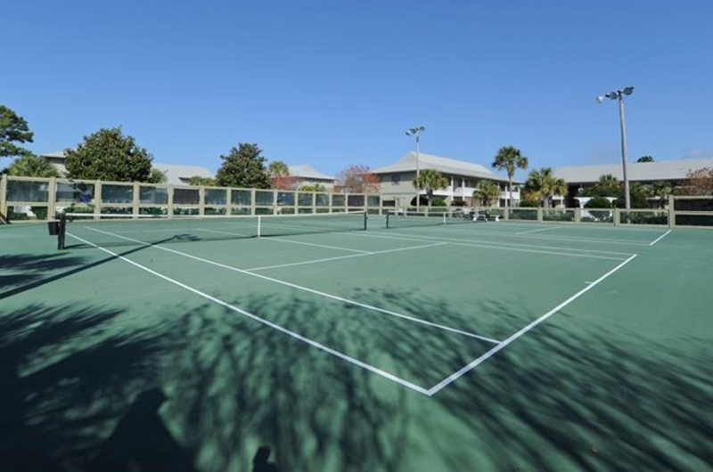 Gets your exercise with a round of tennis at Beachwood Villas in Seagrove Beach FL