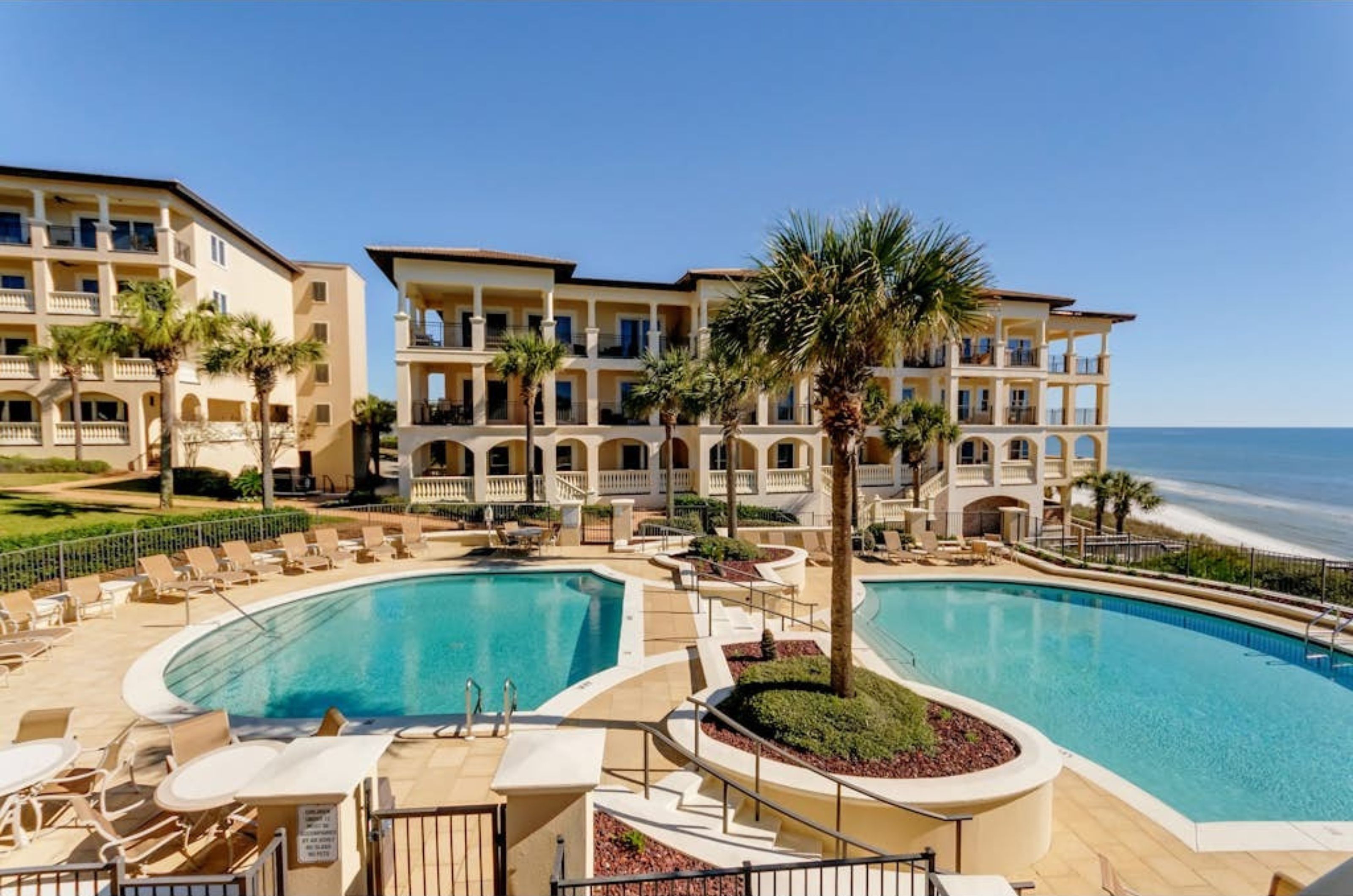 The two Gulf-front outdoor pools in front of the luscious Bella Vita in Santa Rosa Beach Florida 