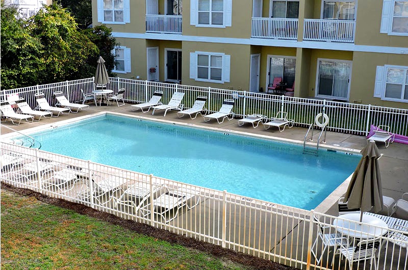 Balcony view of pool at Heron's Watch in Seagrove Beach FL