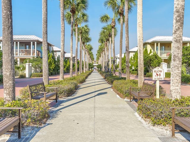 Stroll along the palm-lined walkway at Inn at Seacrest Beach Highway 30-A Florida