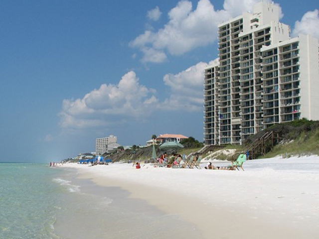 View of beach and water in front of One Seagrove Place Highway 30a Florida