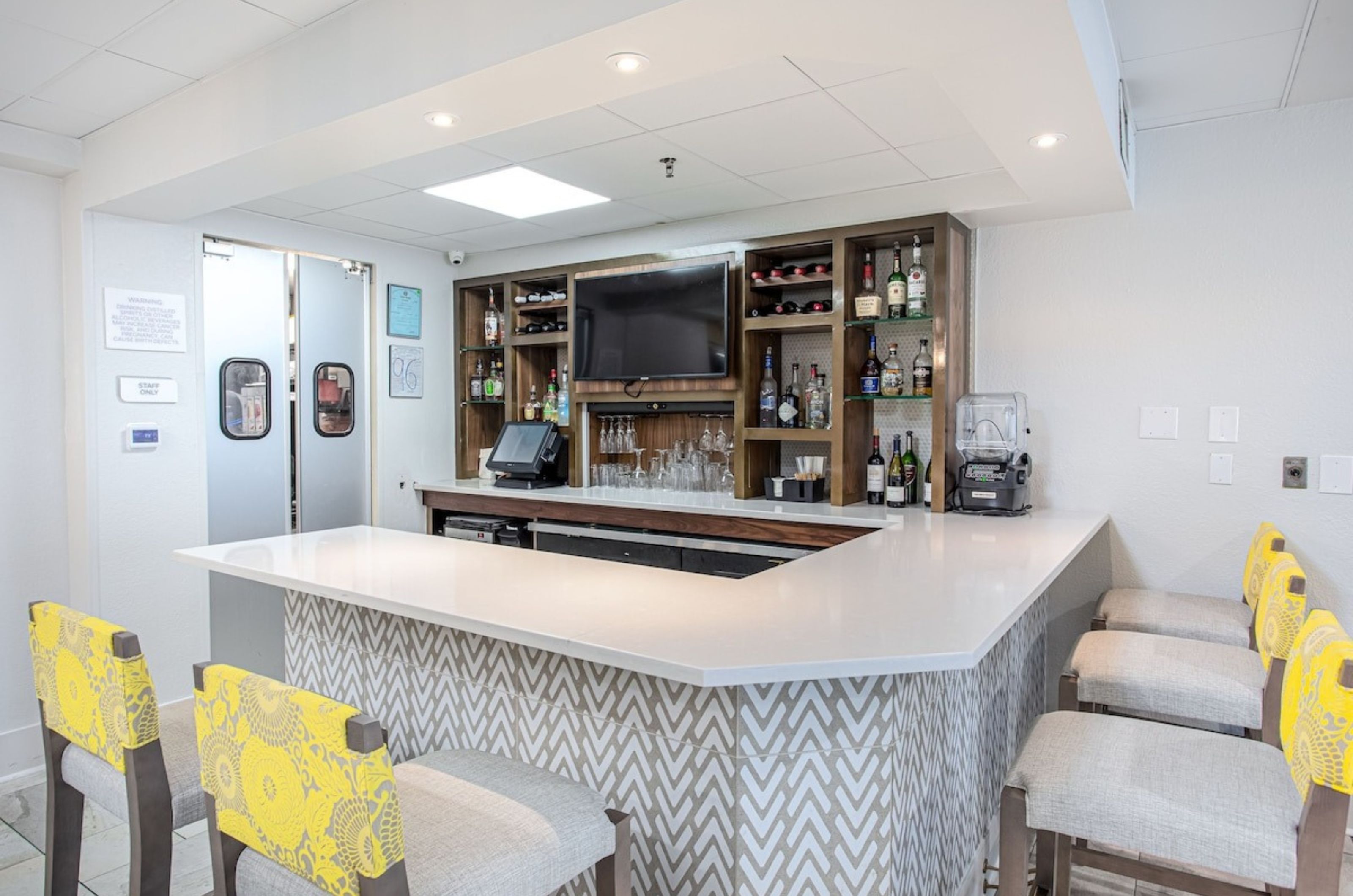 The on-site bar with stools at Hilton Garden Inn at Orange Beach Alabama 