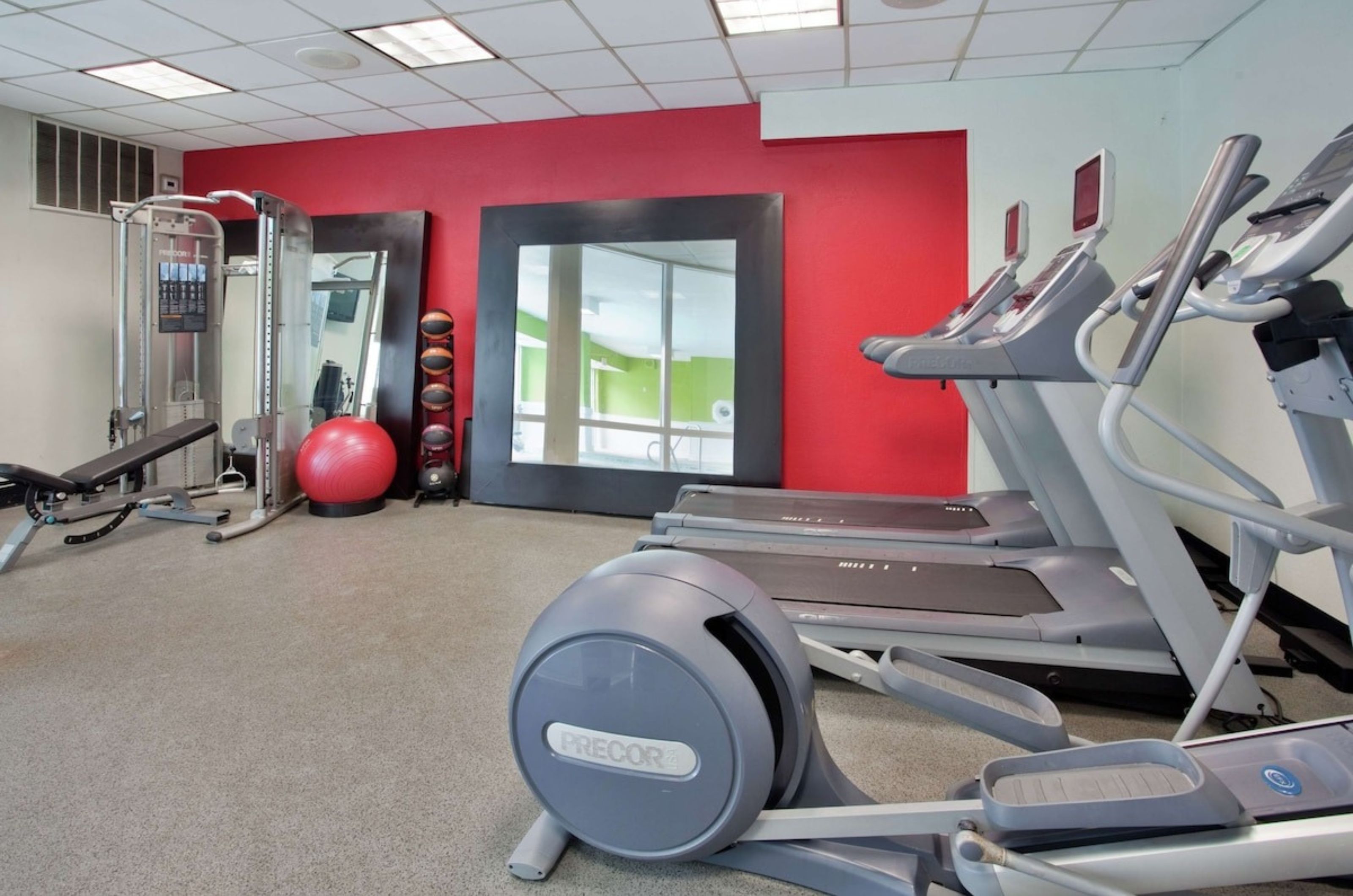 The on-site fitness center with cardio and strength equipment at Hilton Garden Inn in Orange Beach Alabama 