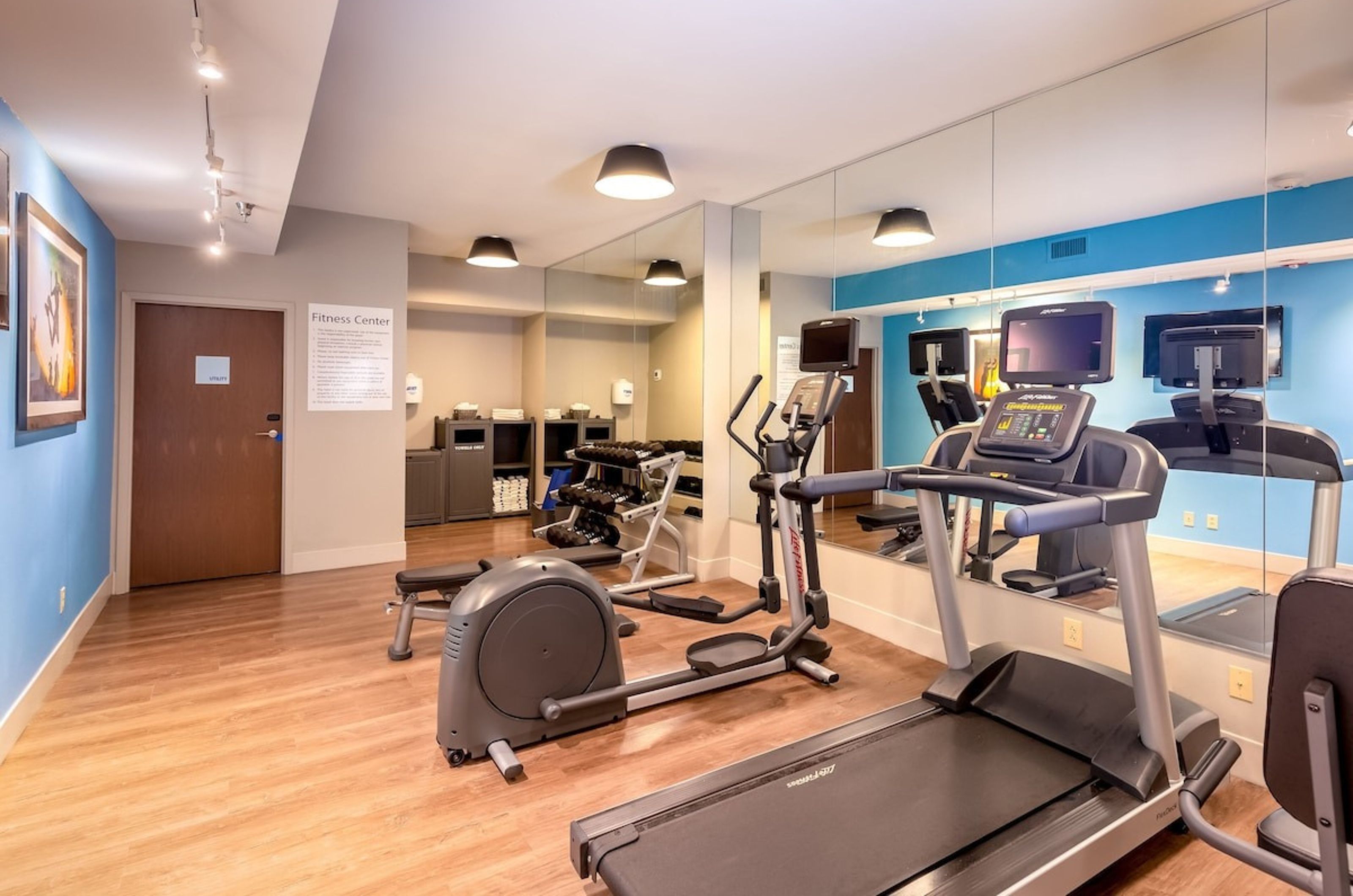 The gym with strength and cardio equipment at Holiday Inn Express in Orange Beach Alabama 