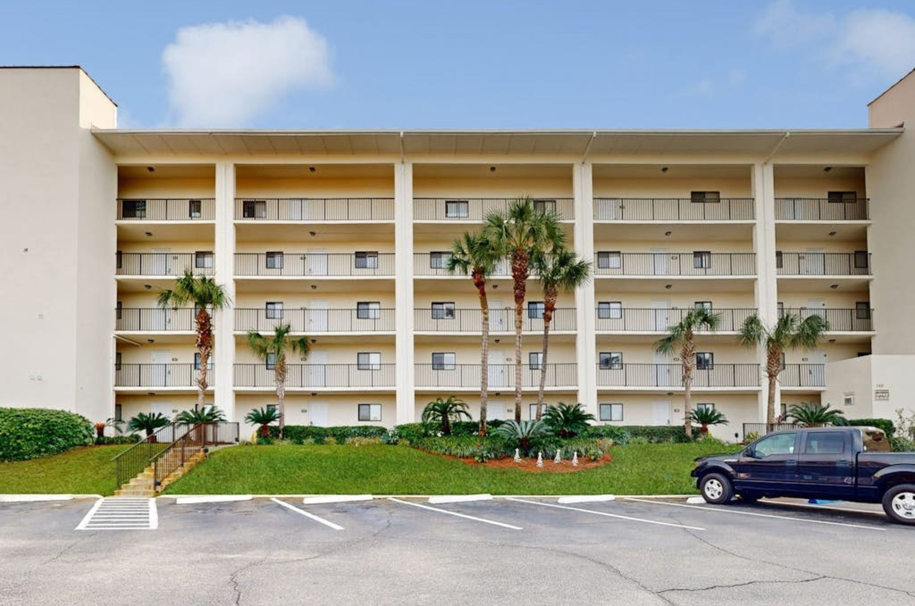 The parking lot next to the exterior of Huntington by the Sea in Destin Florida 