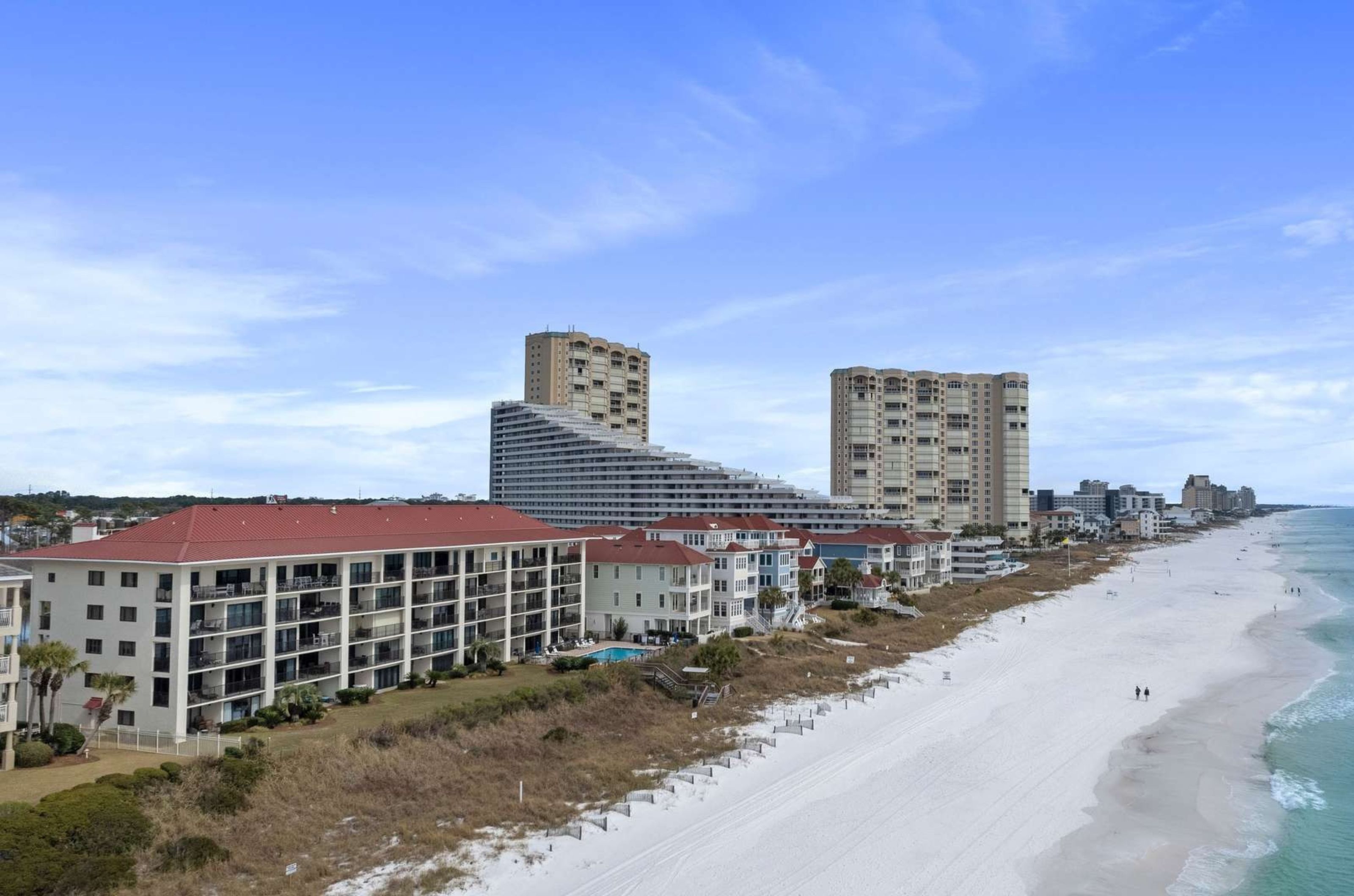 Aerial view of Huntington by the Sea next to a long stretch of white Gulf beaches 