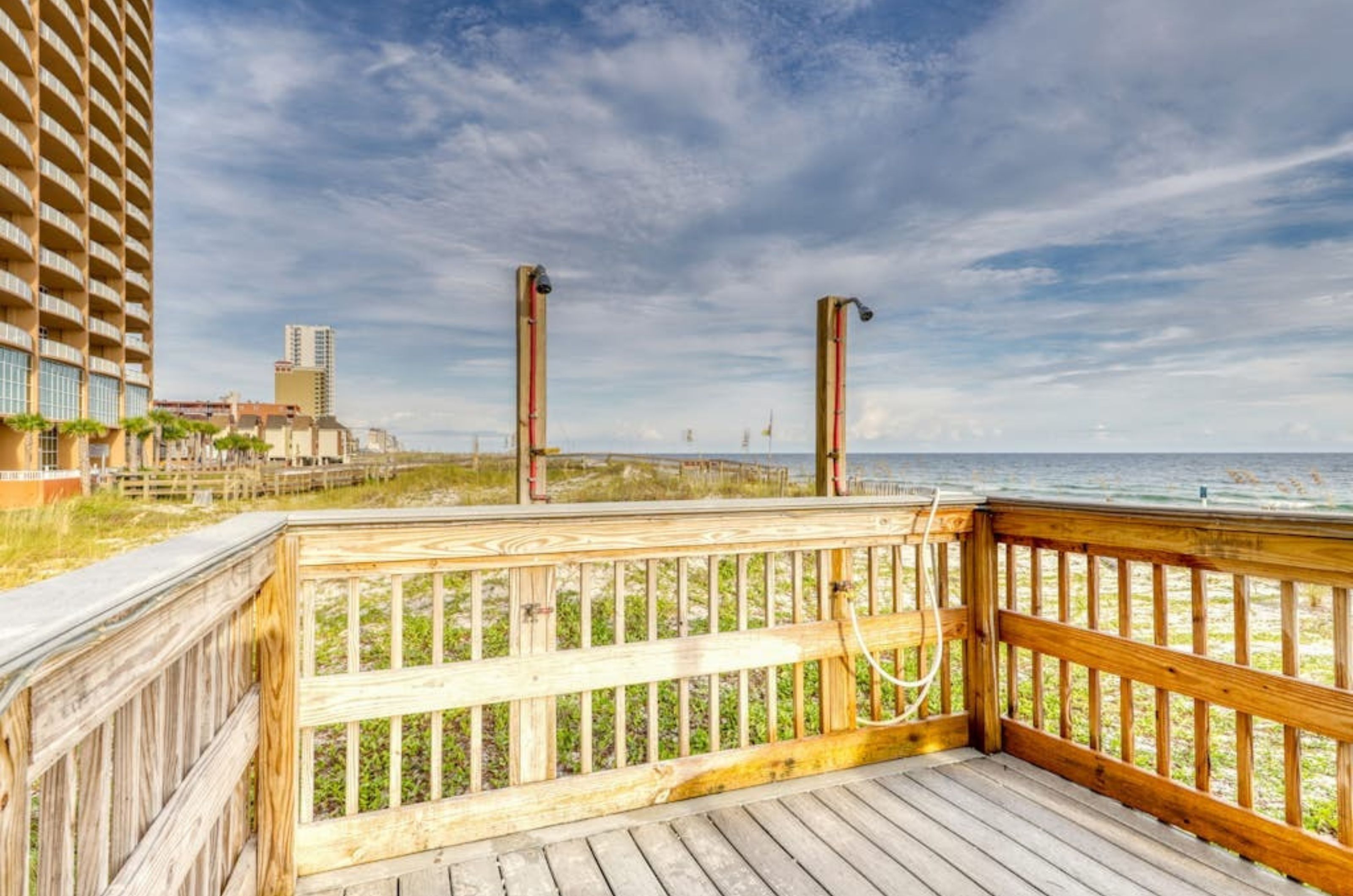 The outdoor showers on the wooden boardwalk at Island Royale 