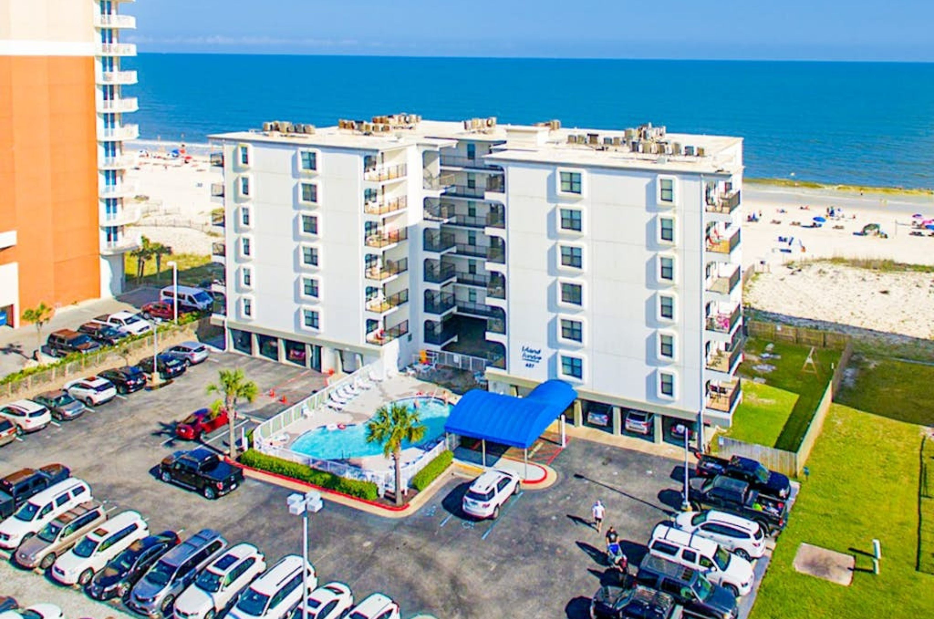 Birds eye view of the streetside of Island Sunrise in Gulf Shores Alabama 