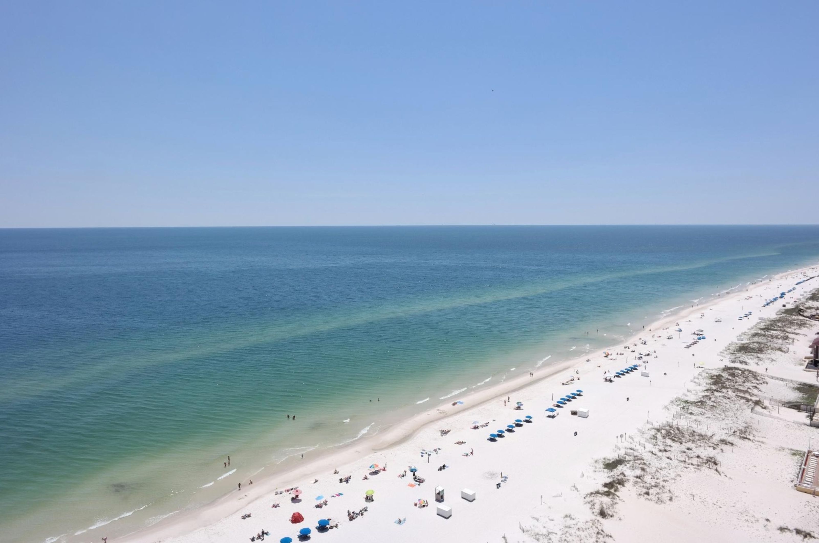 Birds eye view of the beach and the Gulf at Island Tower in Gulf Shores Alabama 