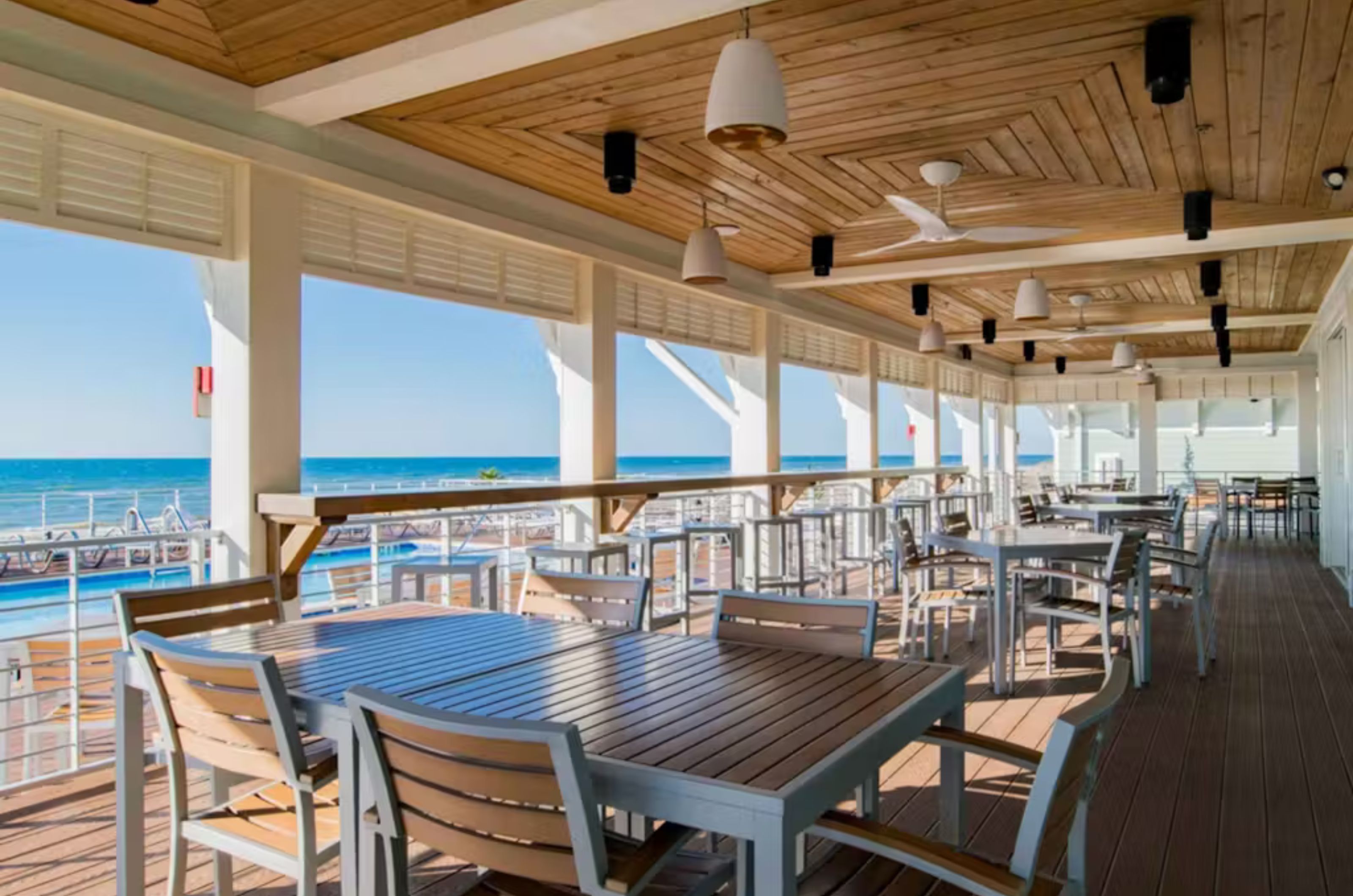 Outdoor covered seating at the Gulf-front Beach Club restaurant 