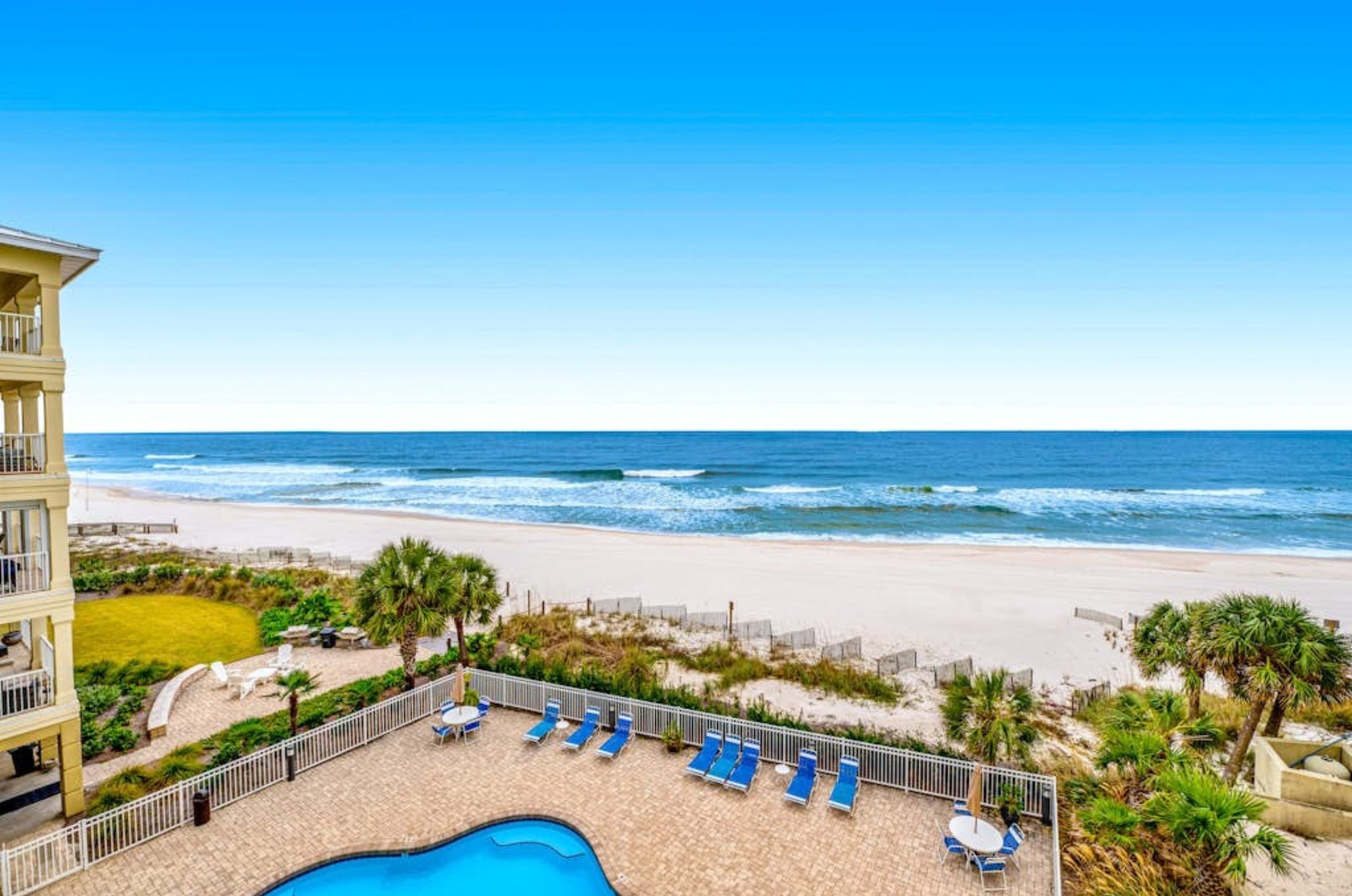 View from a balcony of the swimming pool and beach at Marlin Key in Orange Beach Alabama 