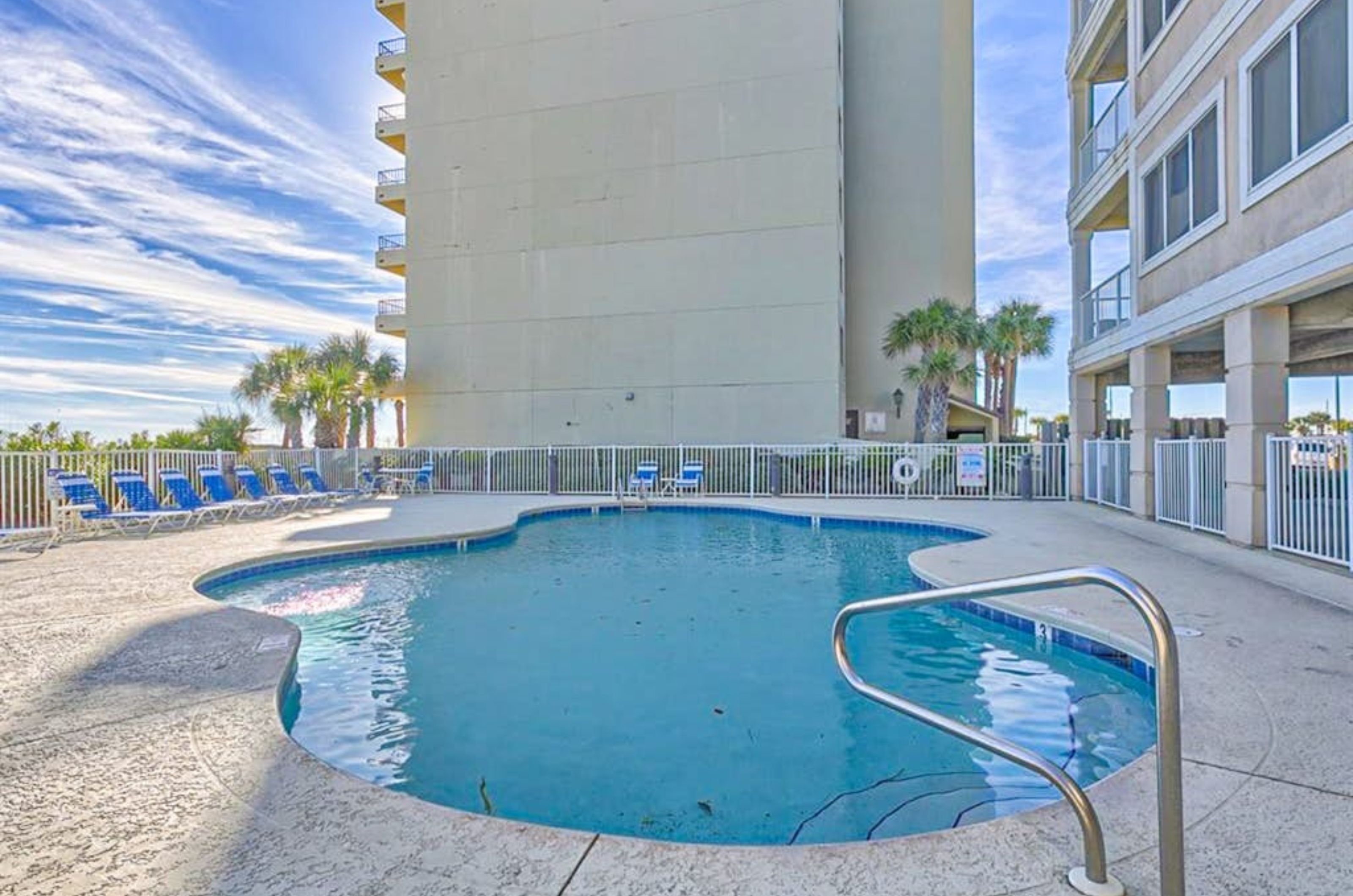 The outdoor swimming pool in front of Marlin Key in Orange Beach Alabama 