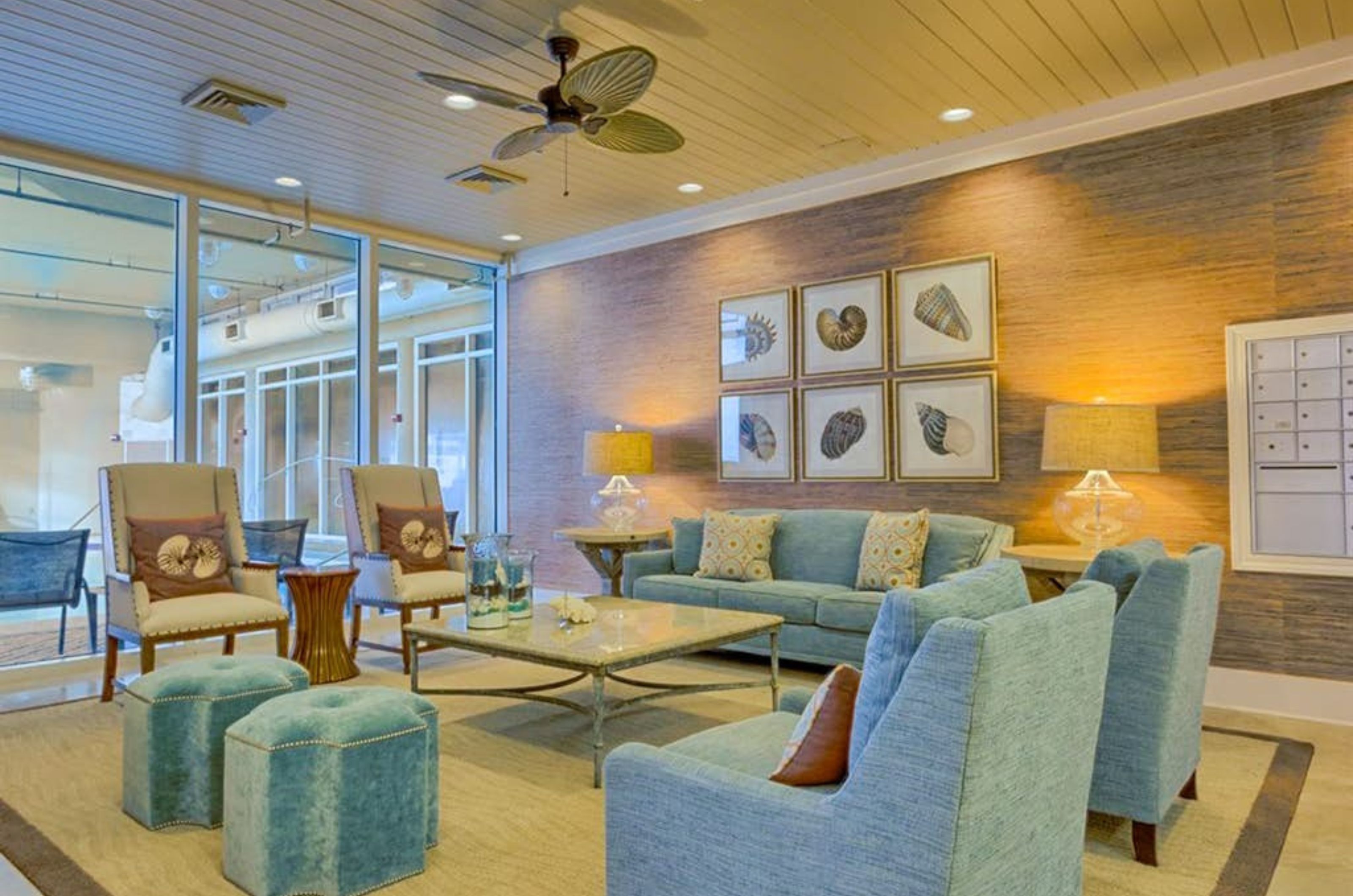 The lobby in the Mediterranean with lounge chairs and atbles 